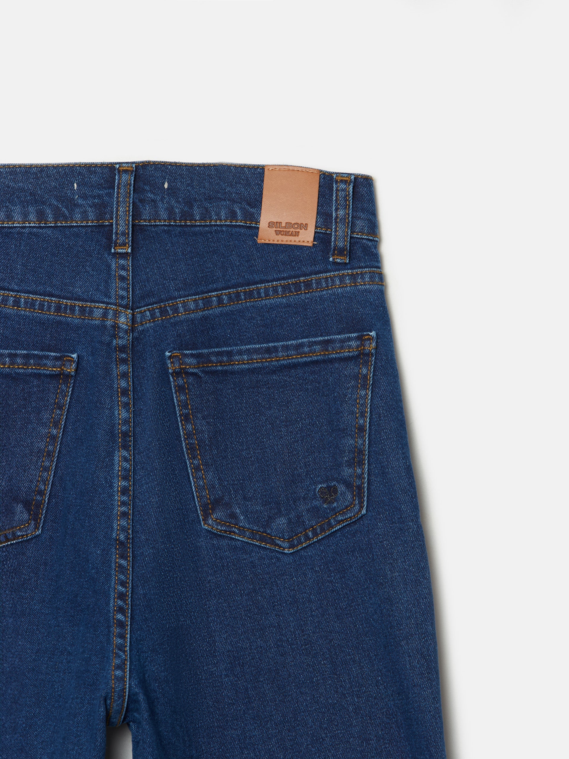 Calças de ganga flare com bolsos