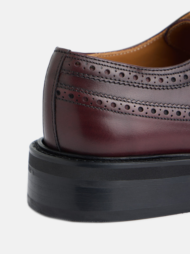 Classic perforated leather shoe in burgundy