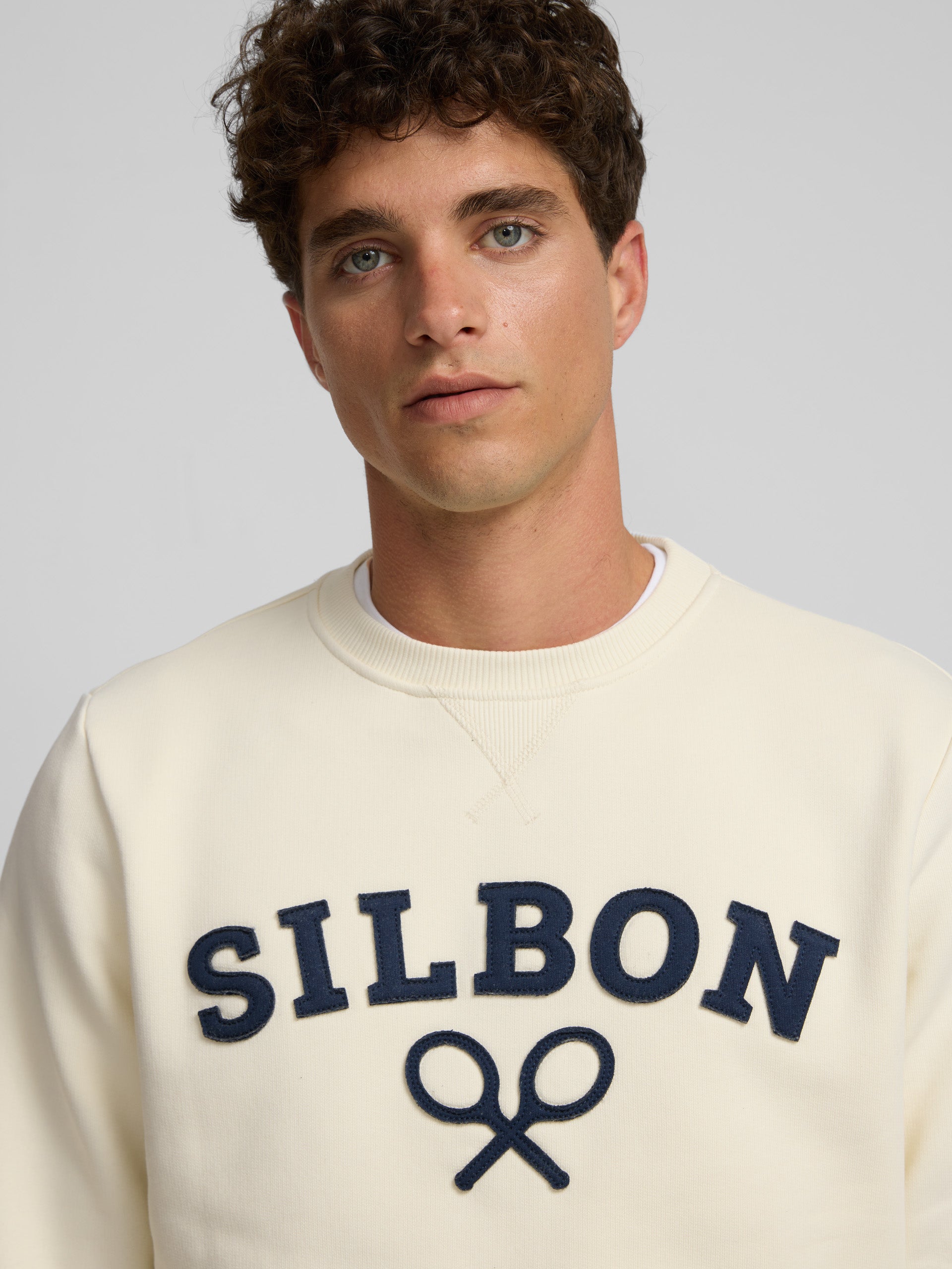 Half cream silbon racket sweatshirt