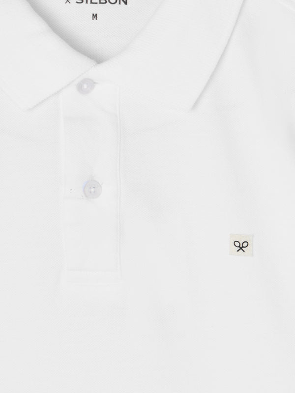 Polo classique à mini patch blanc