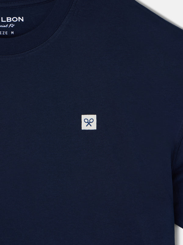 T-shirt uni bleu marine à mini patchs