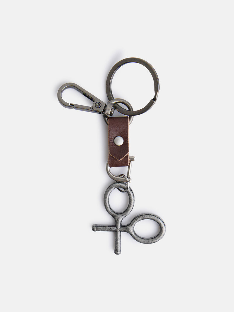 Porta-chaves em pele com detalhe de raquete