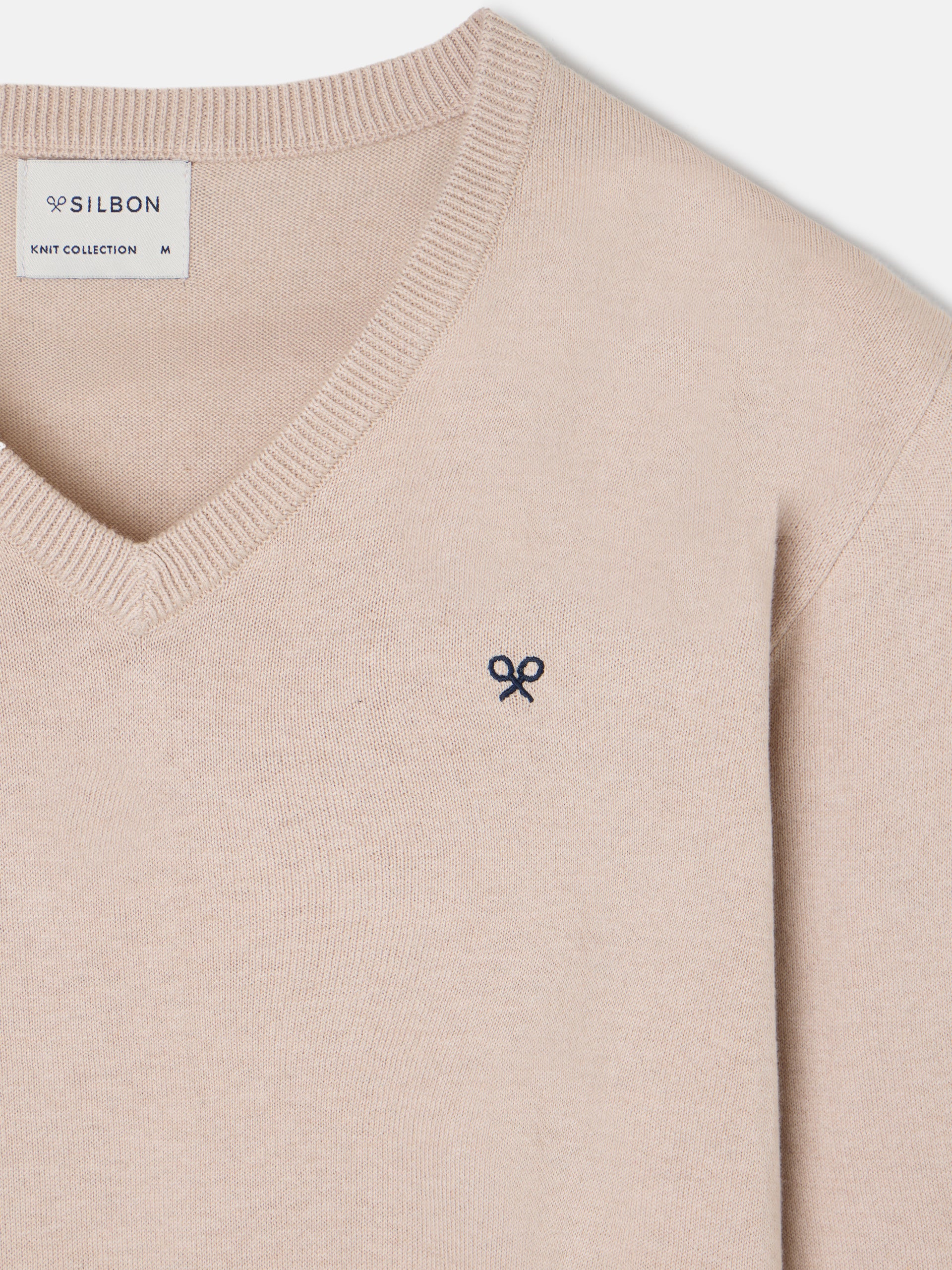Pull classique beige à col en V
