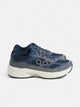 Zapatilla running tono azul