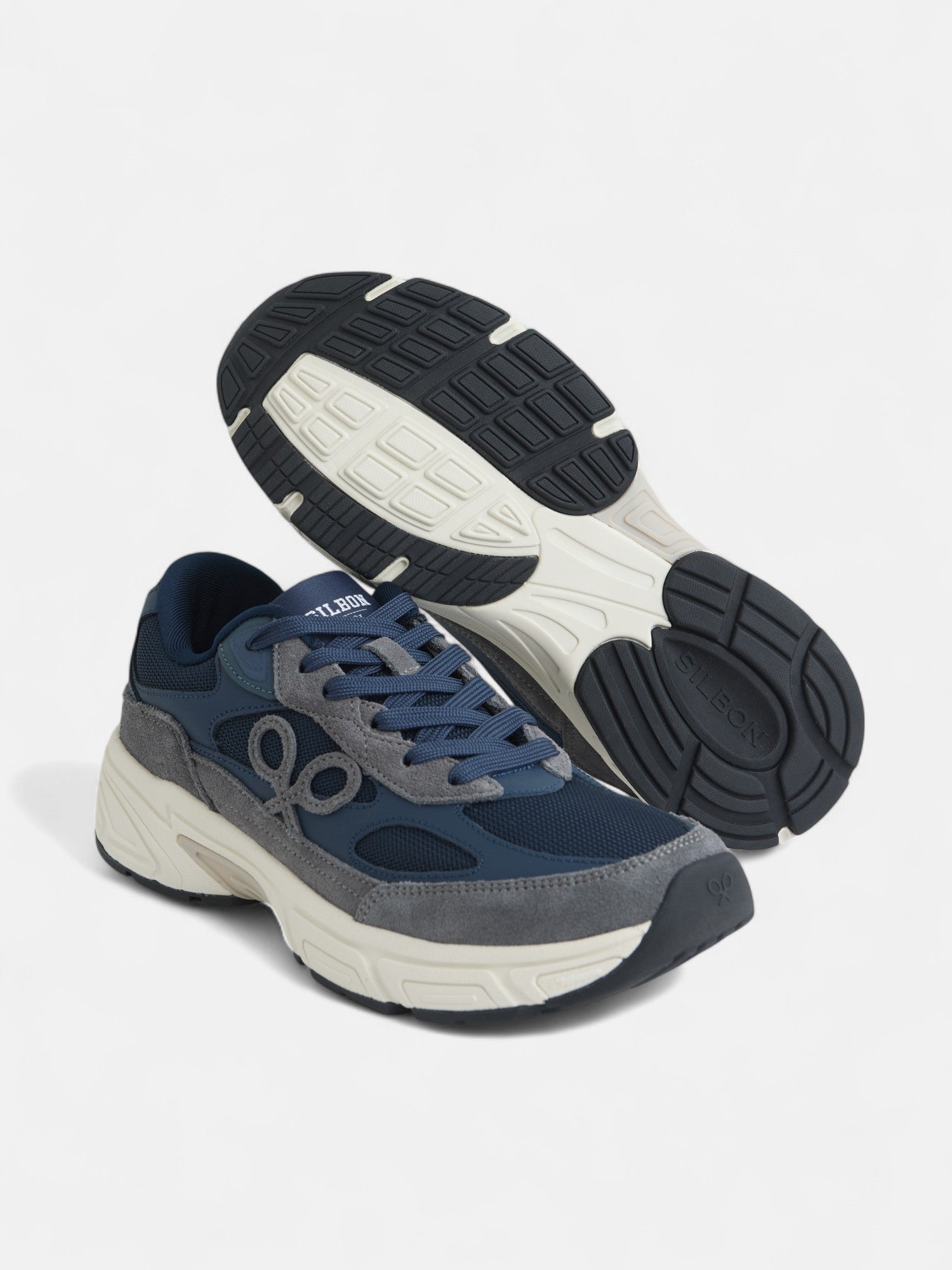 Zapatilla running tono azul