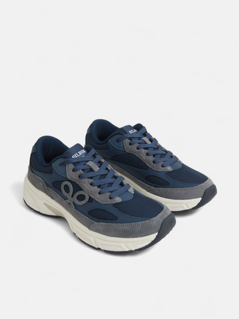 Zapatilla running tono azul