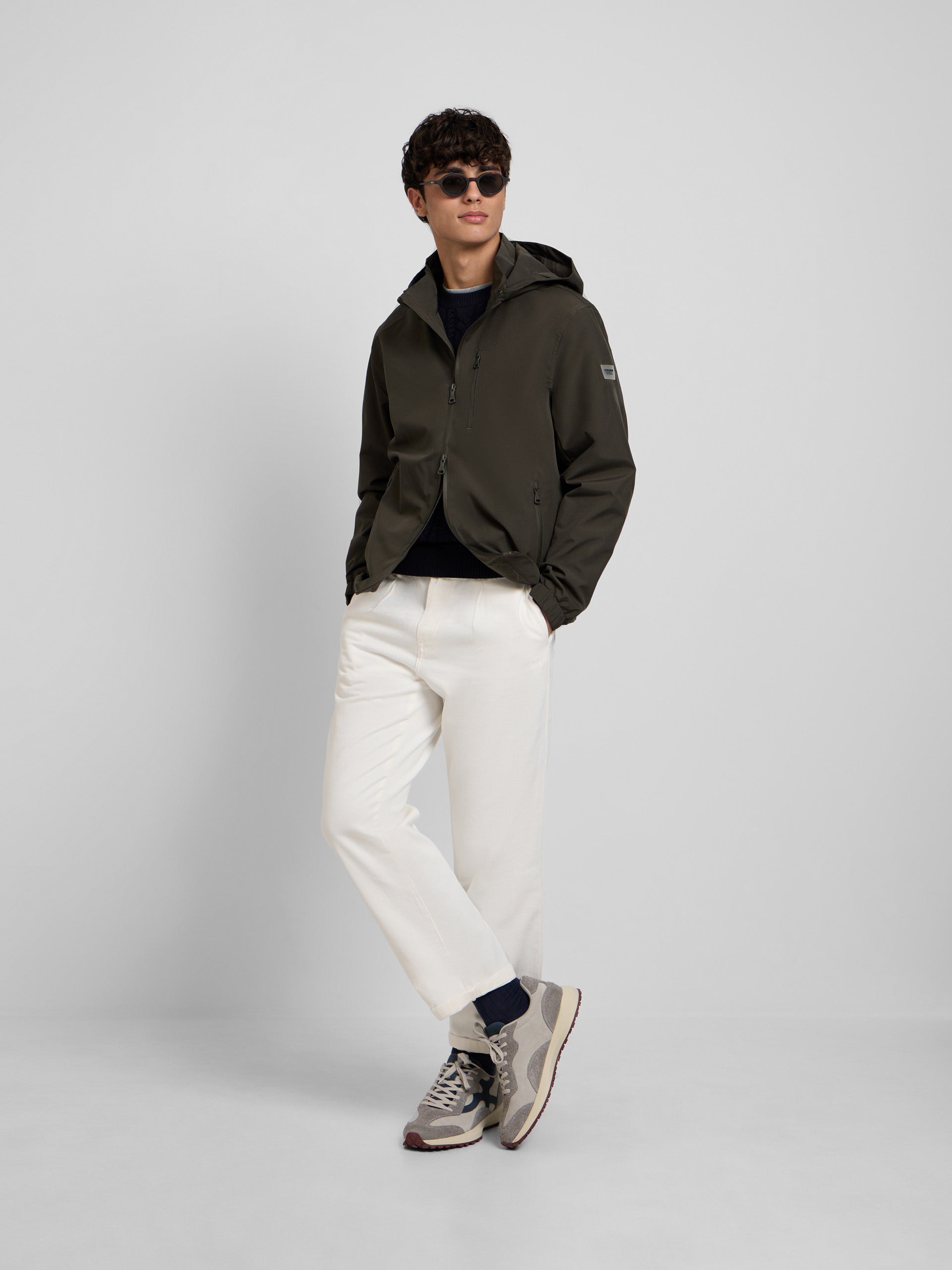 Green windbreaker hooded jacket