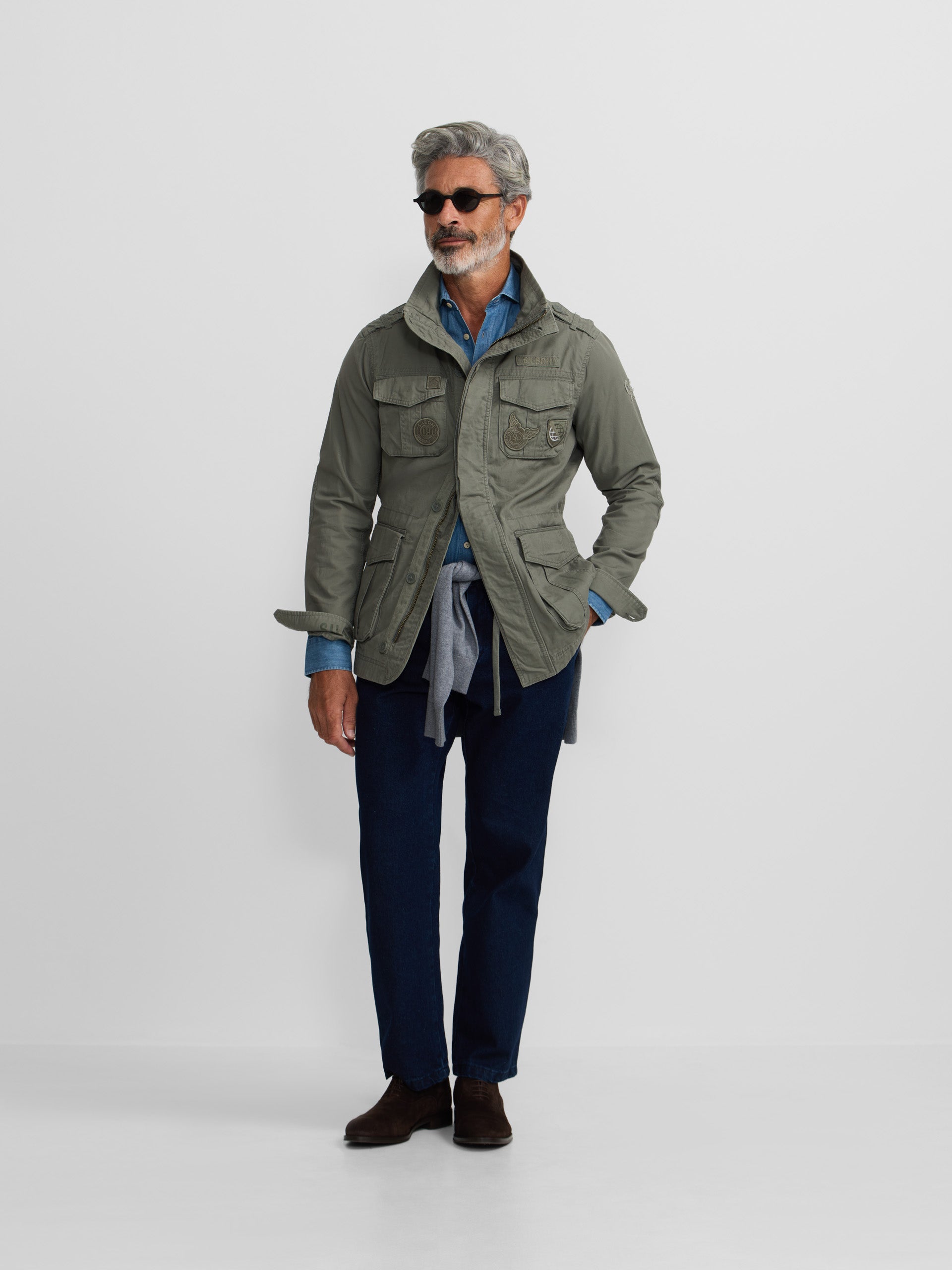 Military jacket with green dye patches