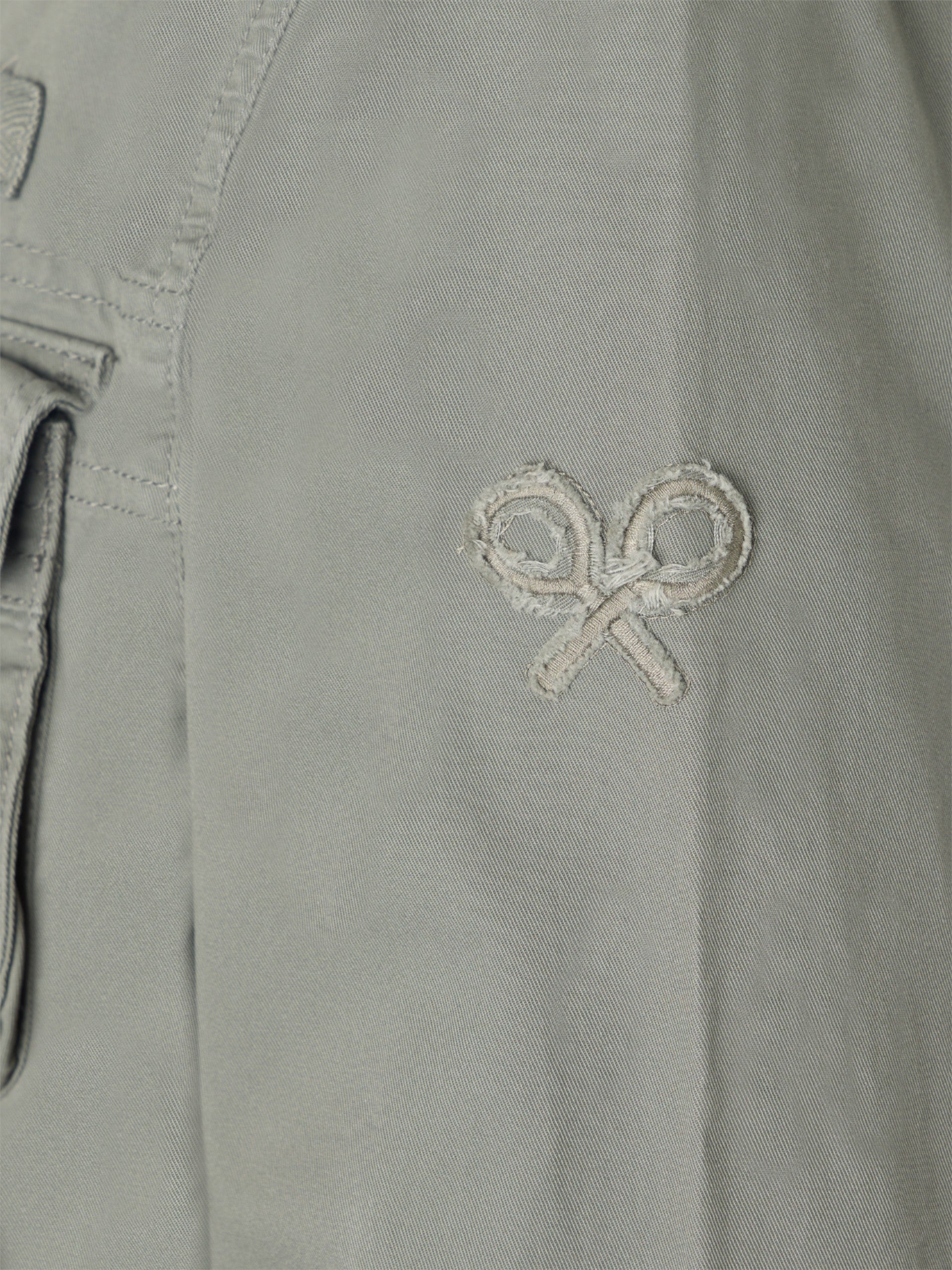 Military jacket with green dye patches