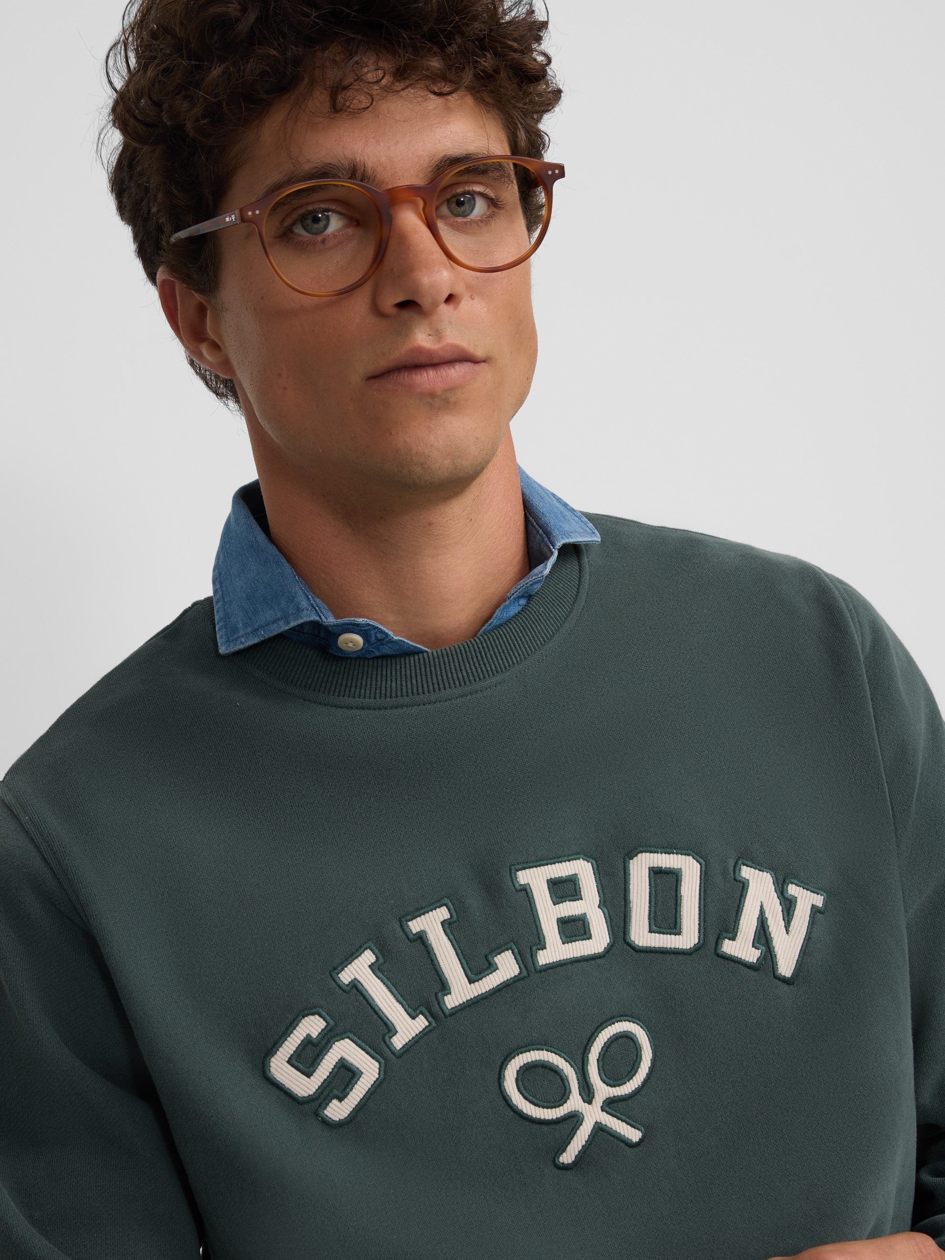 Dark green corduroy medium-length racket sweatshirt