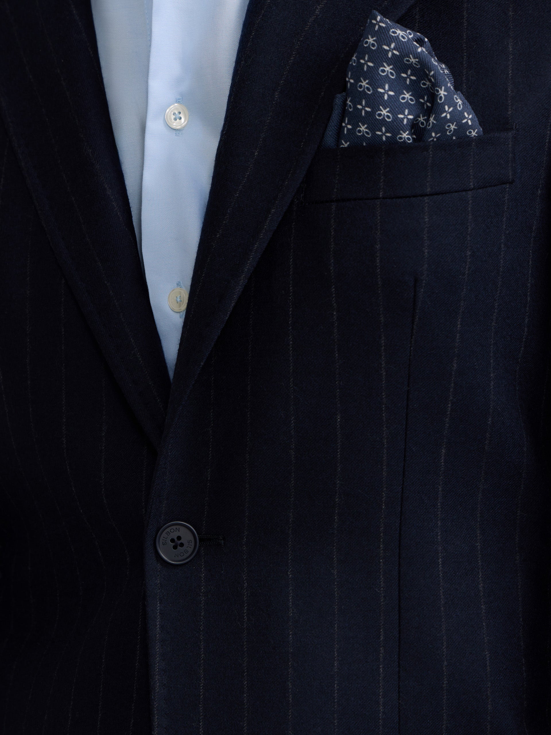 Navy blue pinstripe blazer