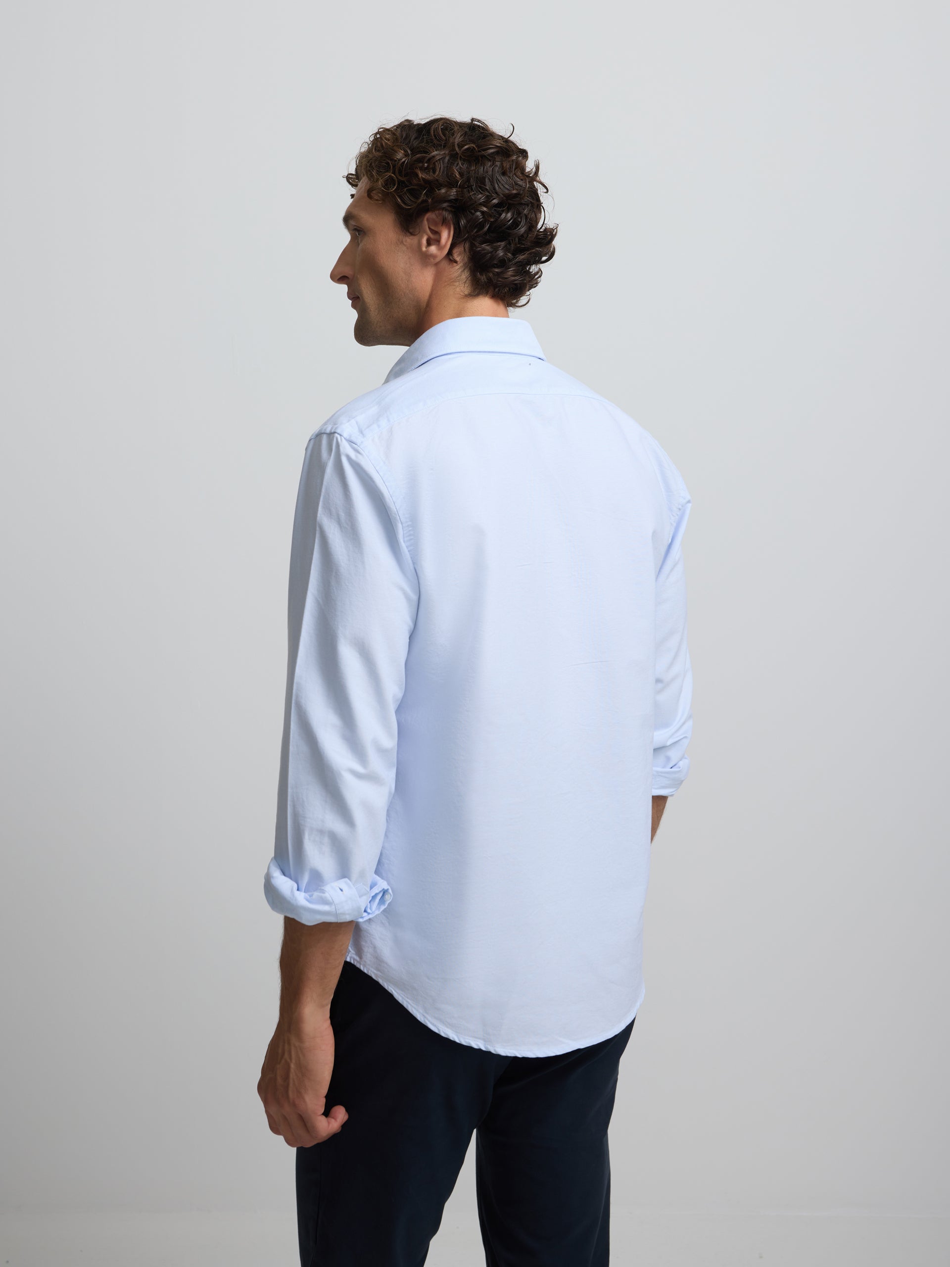 Polo sport Oxford bleu clair avec poche
