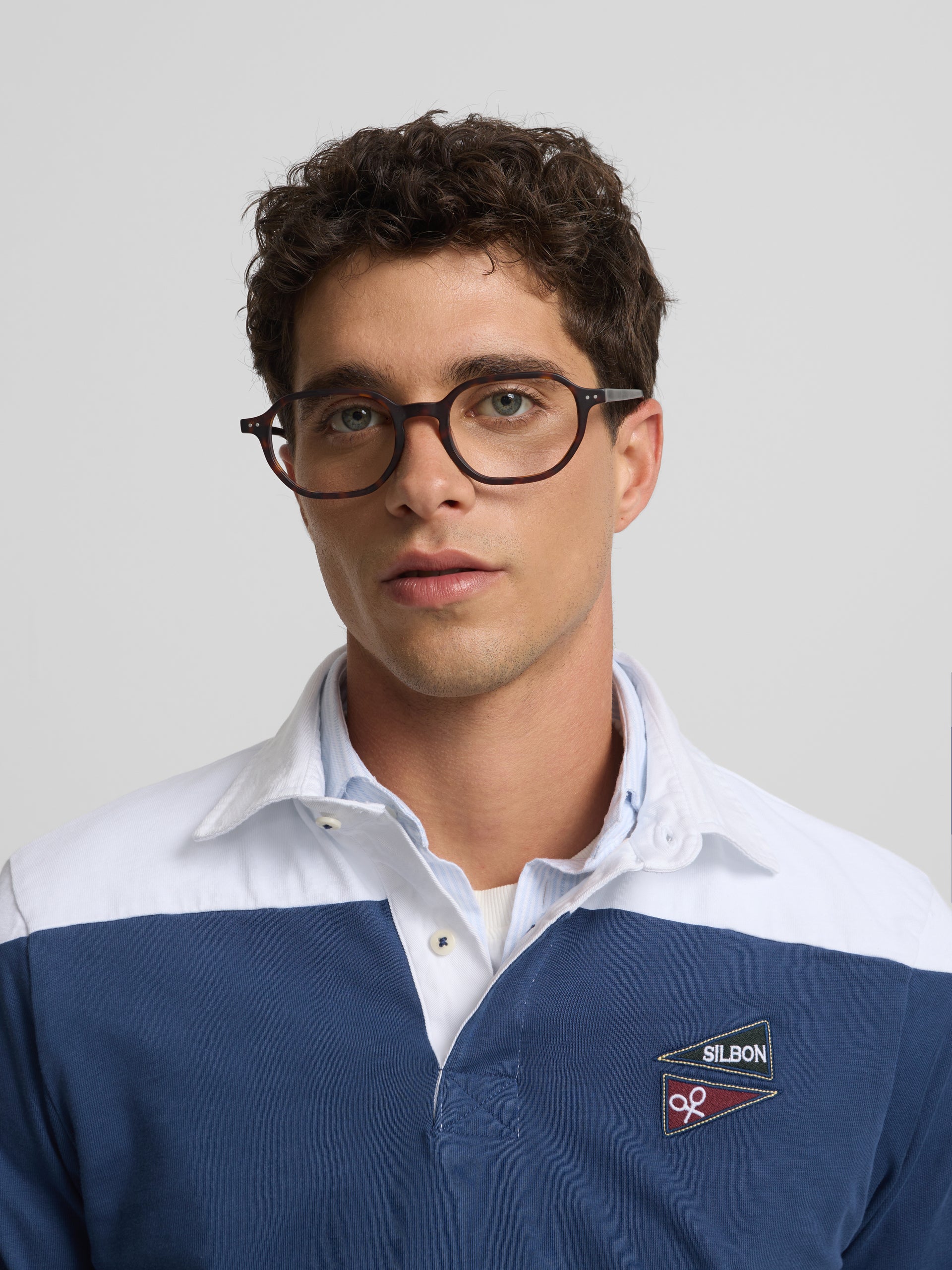 Polo clássico de rugby às riscas azuis