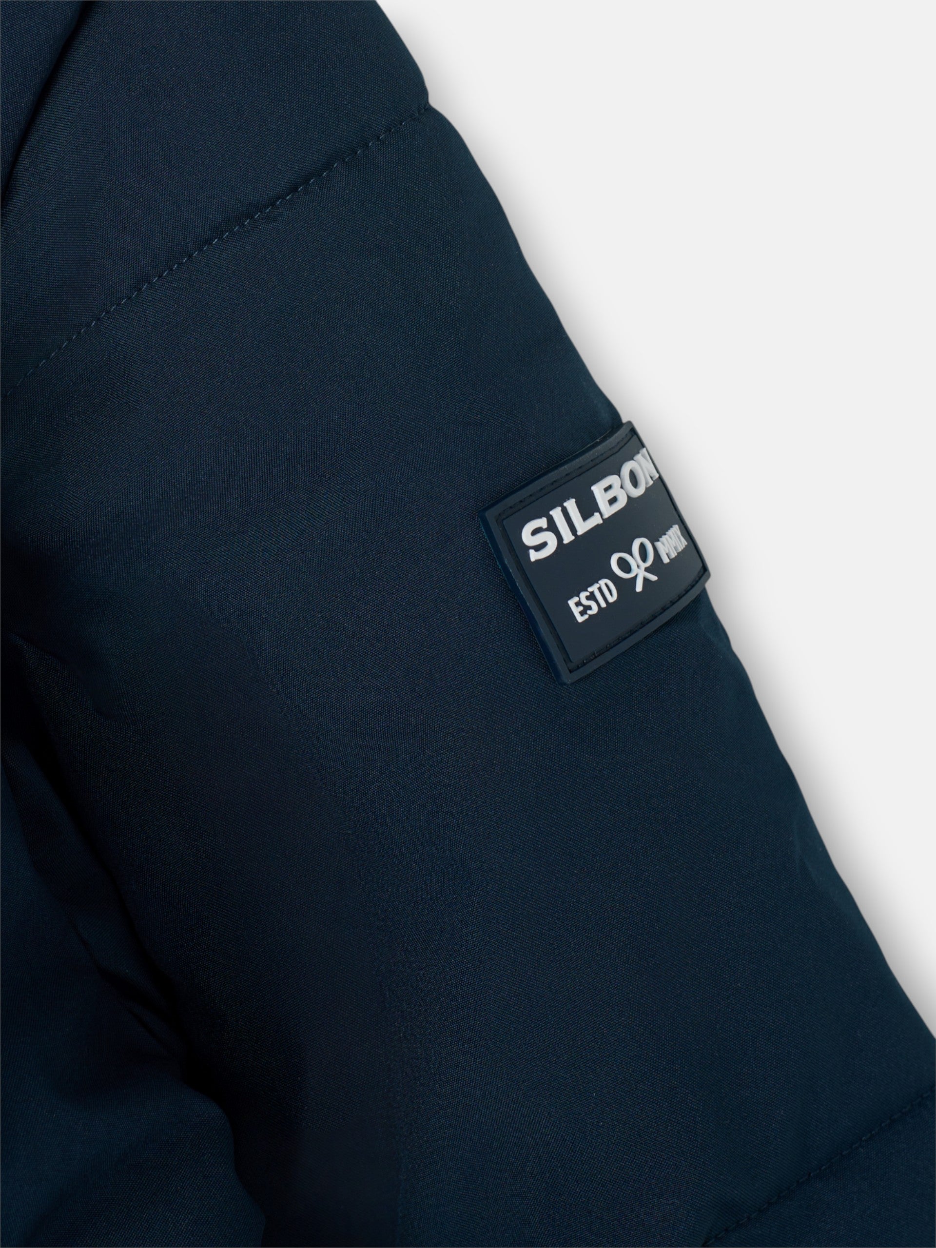 Manteau long matelassé pour enfant en bleu marine