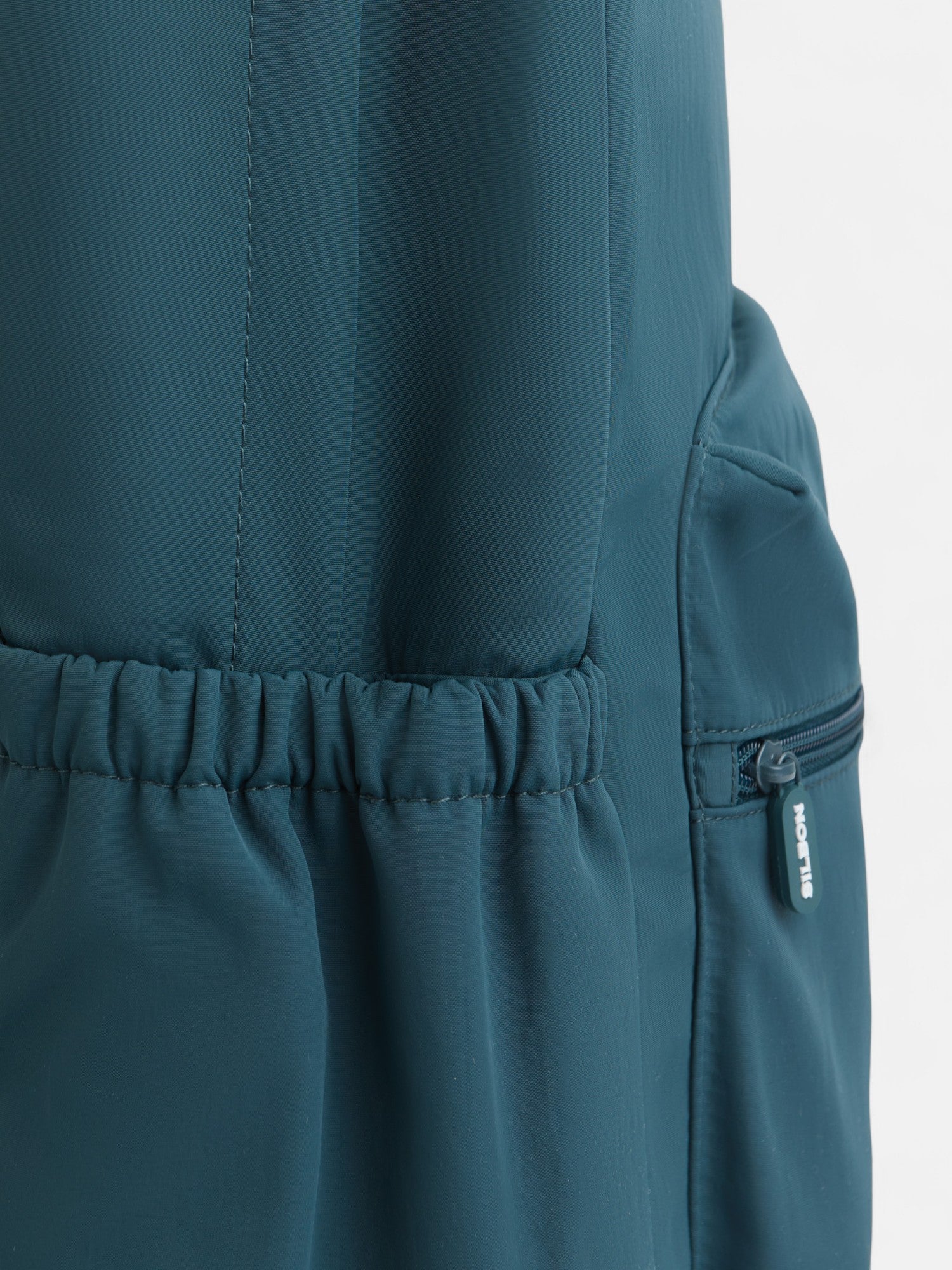 Sac à dos technique vert pour raquettes à neige