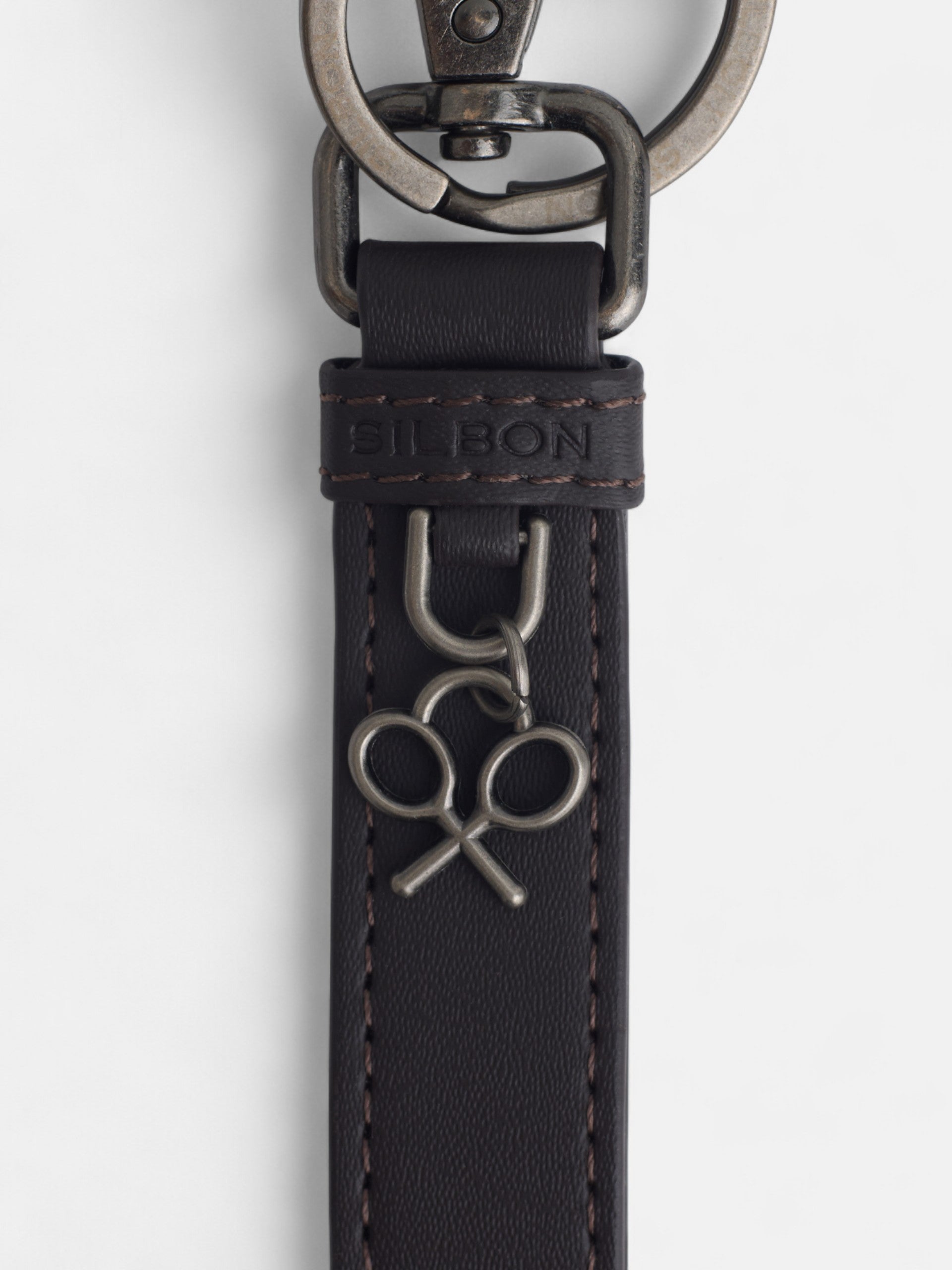 Llavero piel rayado detalle raqueta