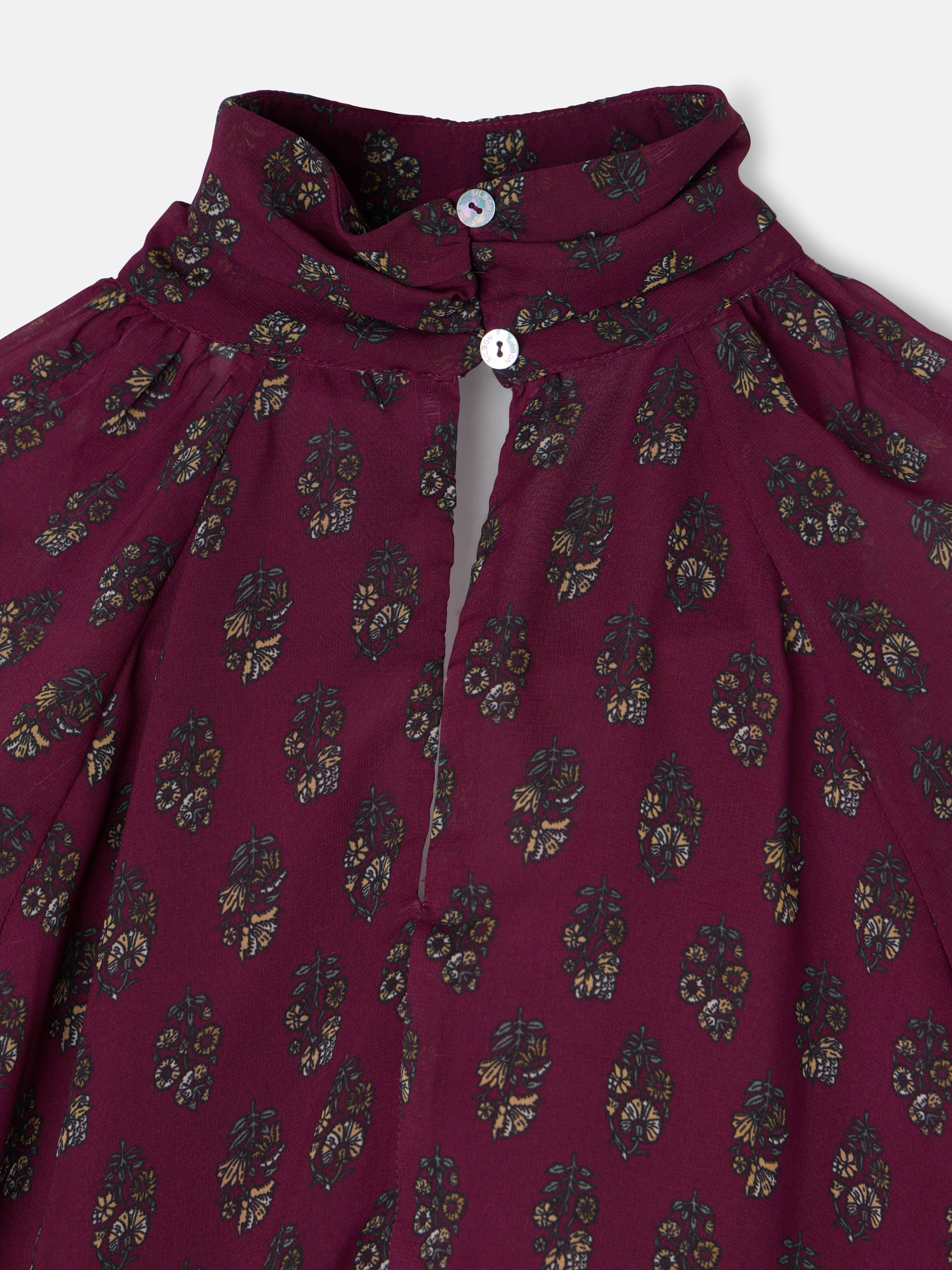Blusa cuello estampado motivos burdeos