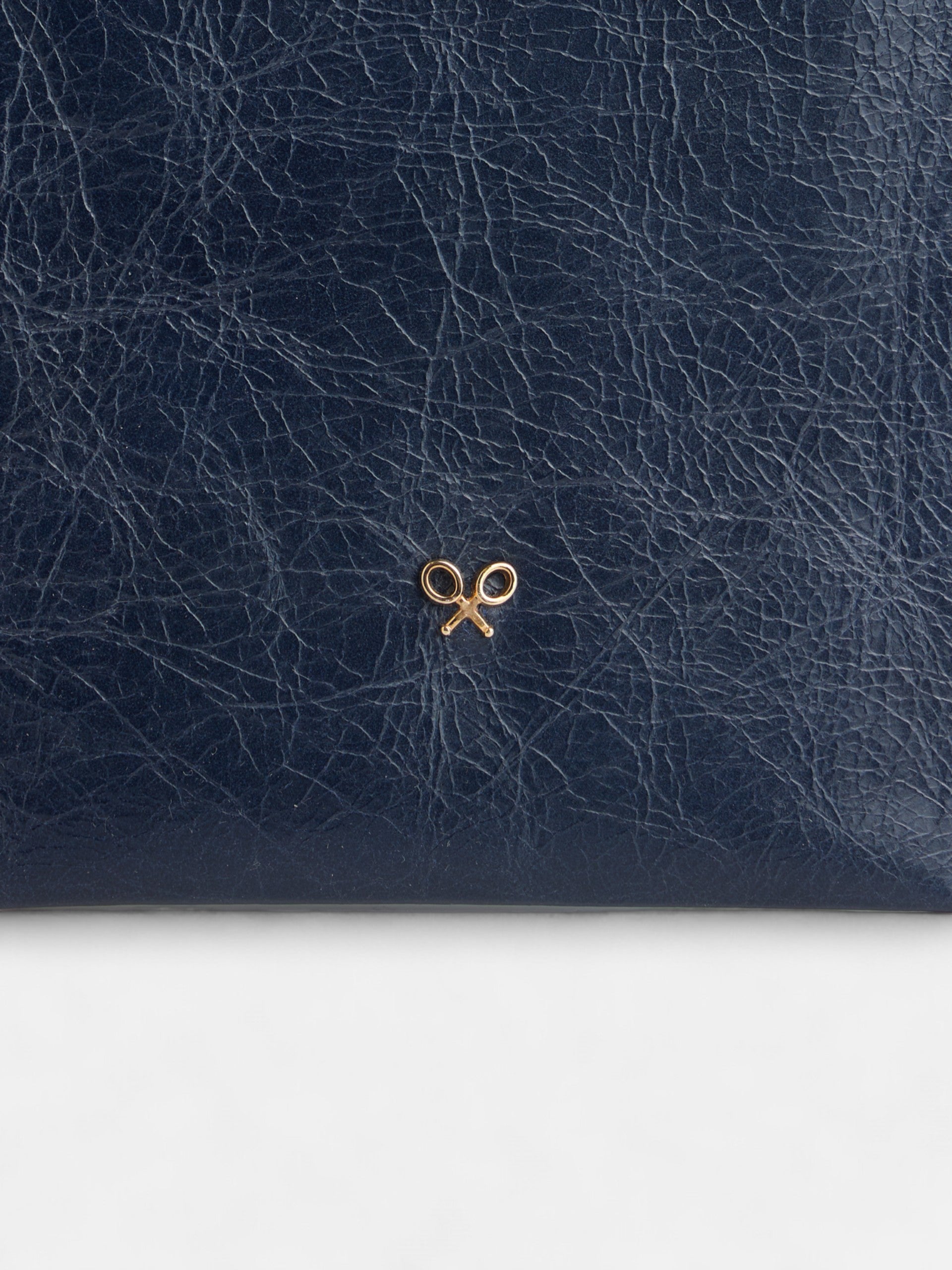 Porta-telemóvel em pele com cordão étnico azul-marinho