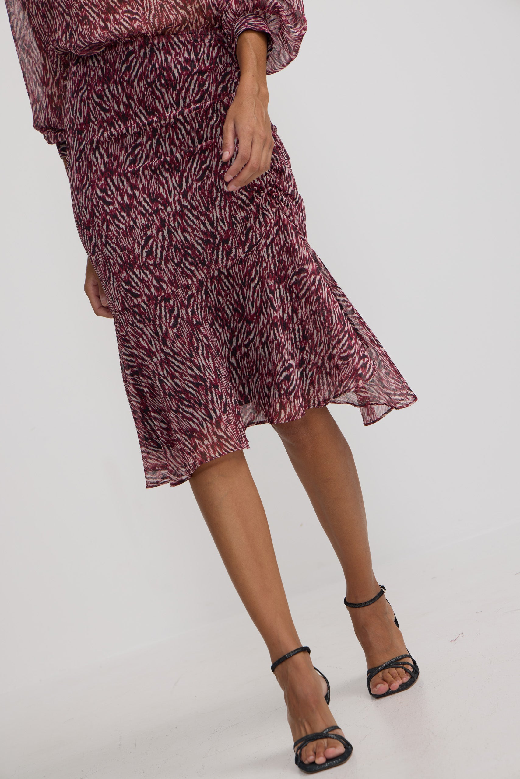 Falda midi estampado animal print burdeos