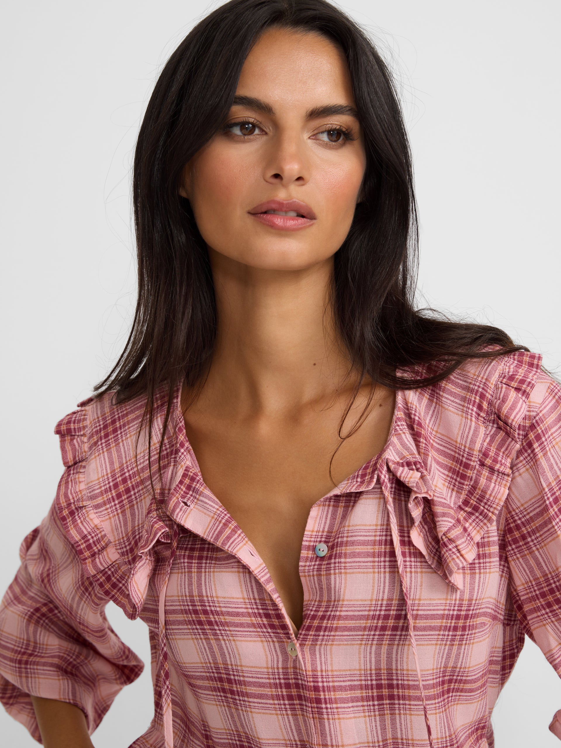 Blusa com gola bobo aos quadrados rosa