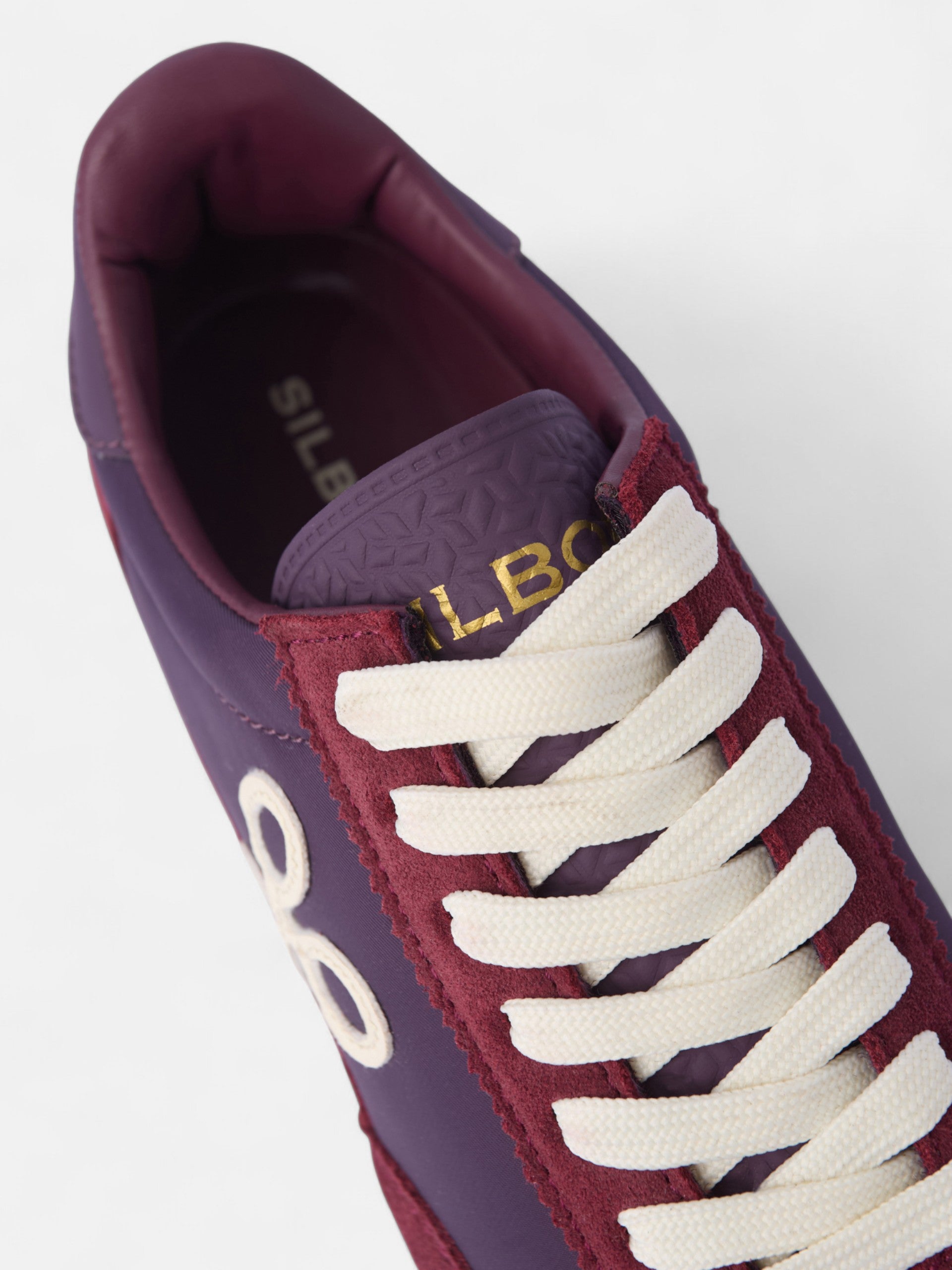 Zapatilla running raqueta burdeos