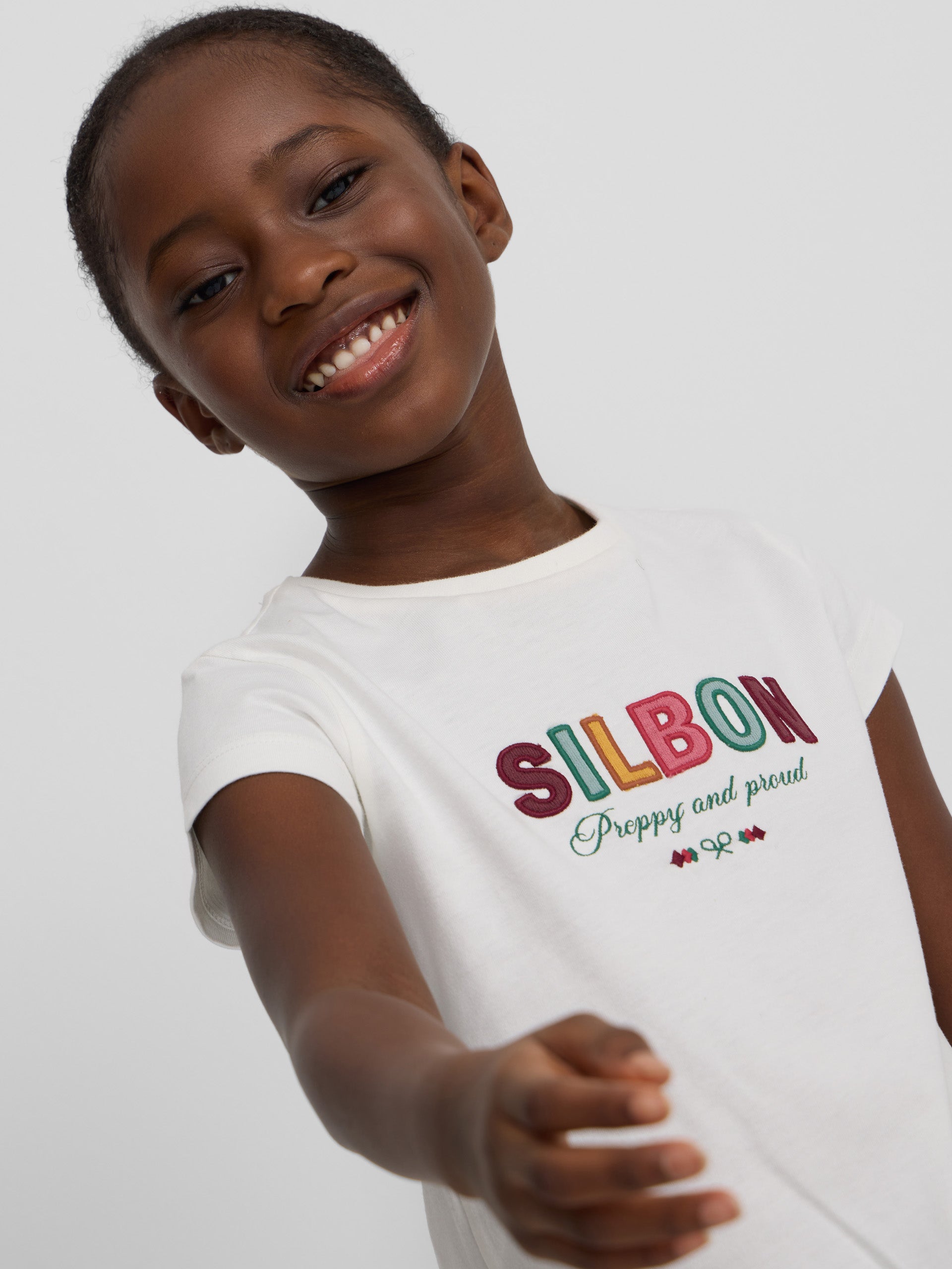 Camiseta girl letras silbon blanca