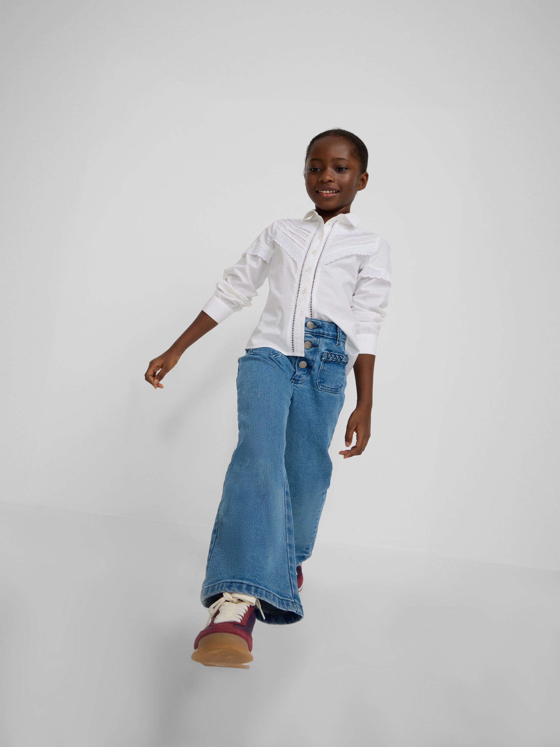 Girl's pants with braided pockets and denim