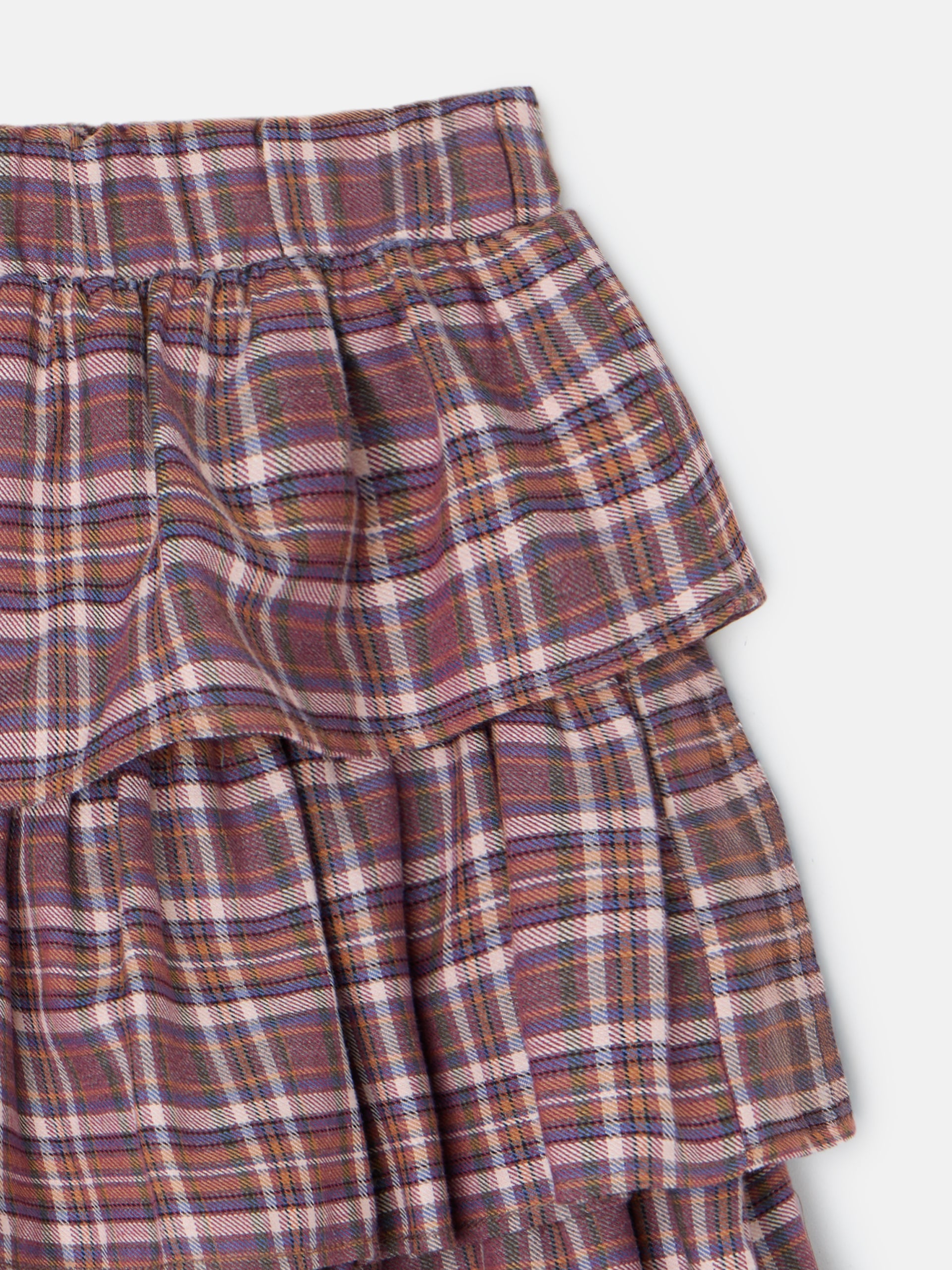 Saia de menina com folhos e padrão de xadrez roxo e rosa