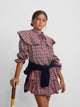 Girl's blouse with purple and pink checkered ruffles