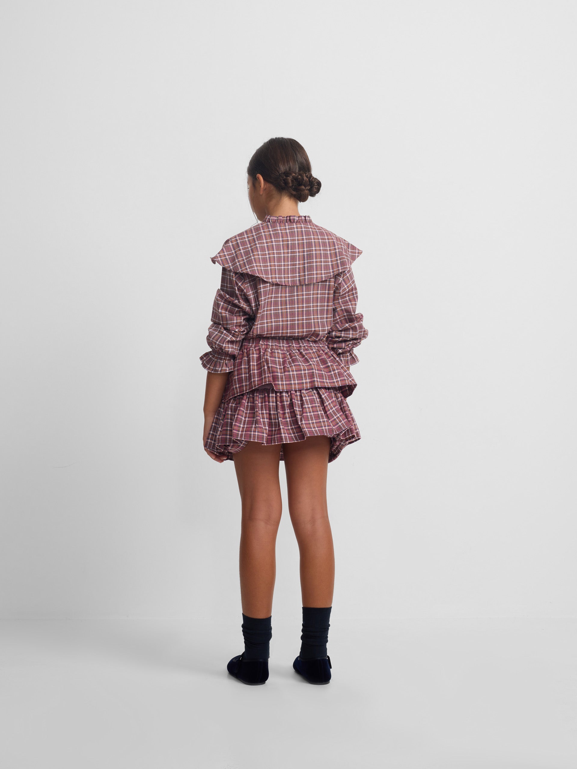 Girl's blouse with purple and pink checkered ruffles