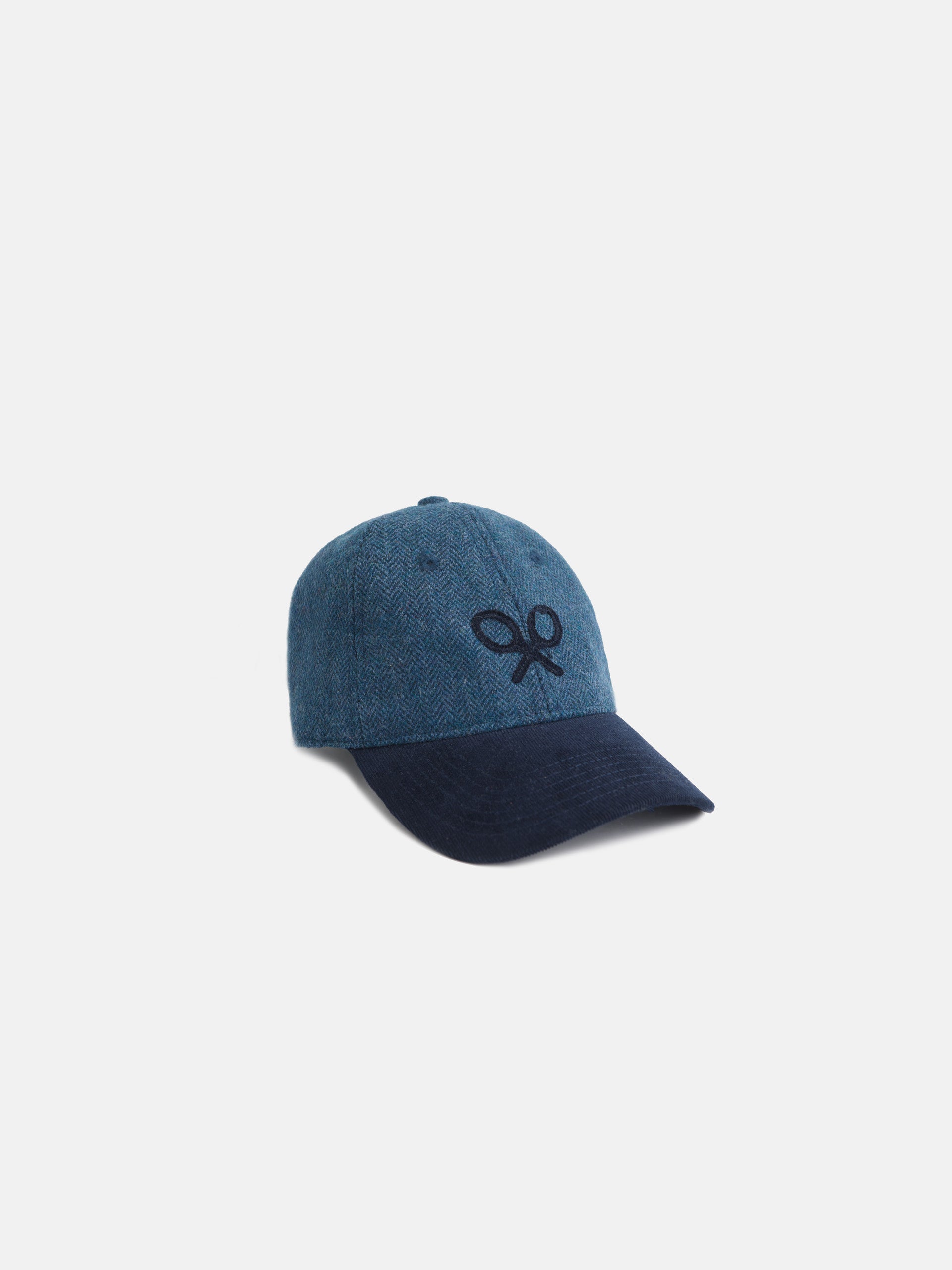 Casquette fille bleu marine à chevrons et raquettes