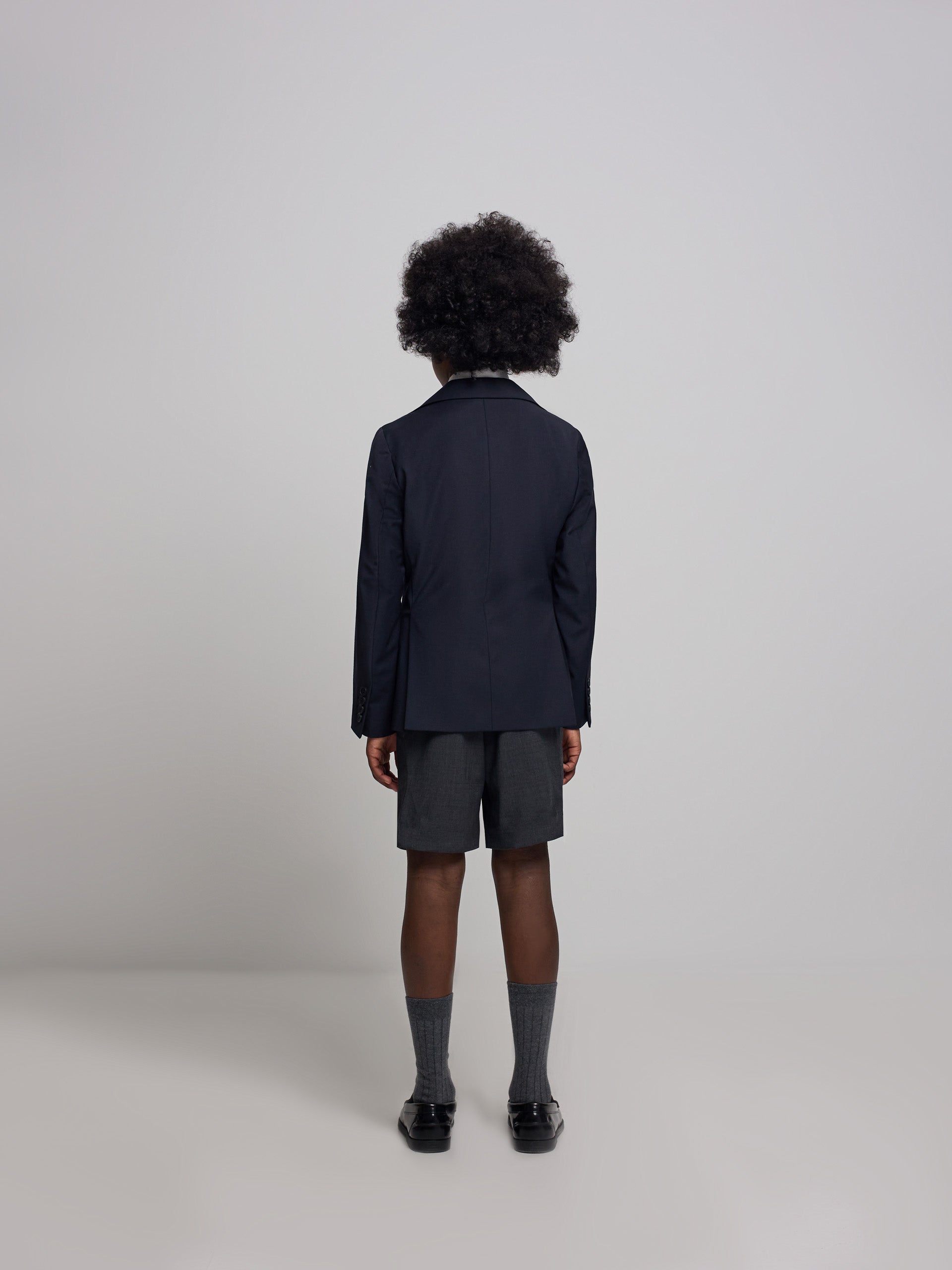 Americana kids clasica cruzada azul marino