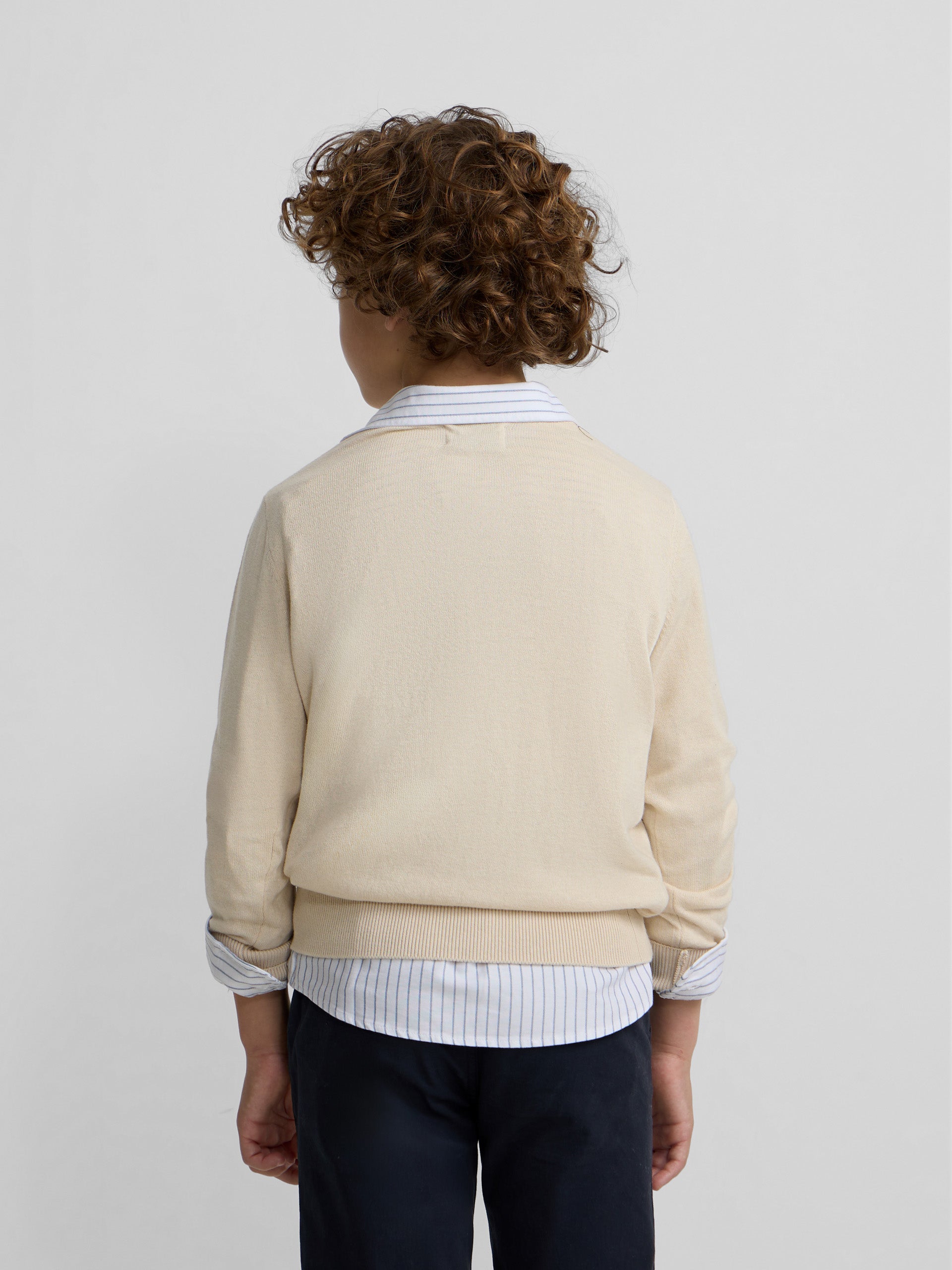 Camisola de criança bege com decote em V