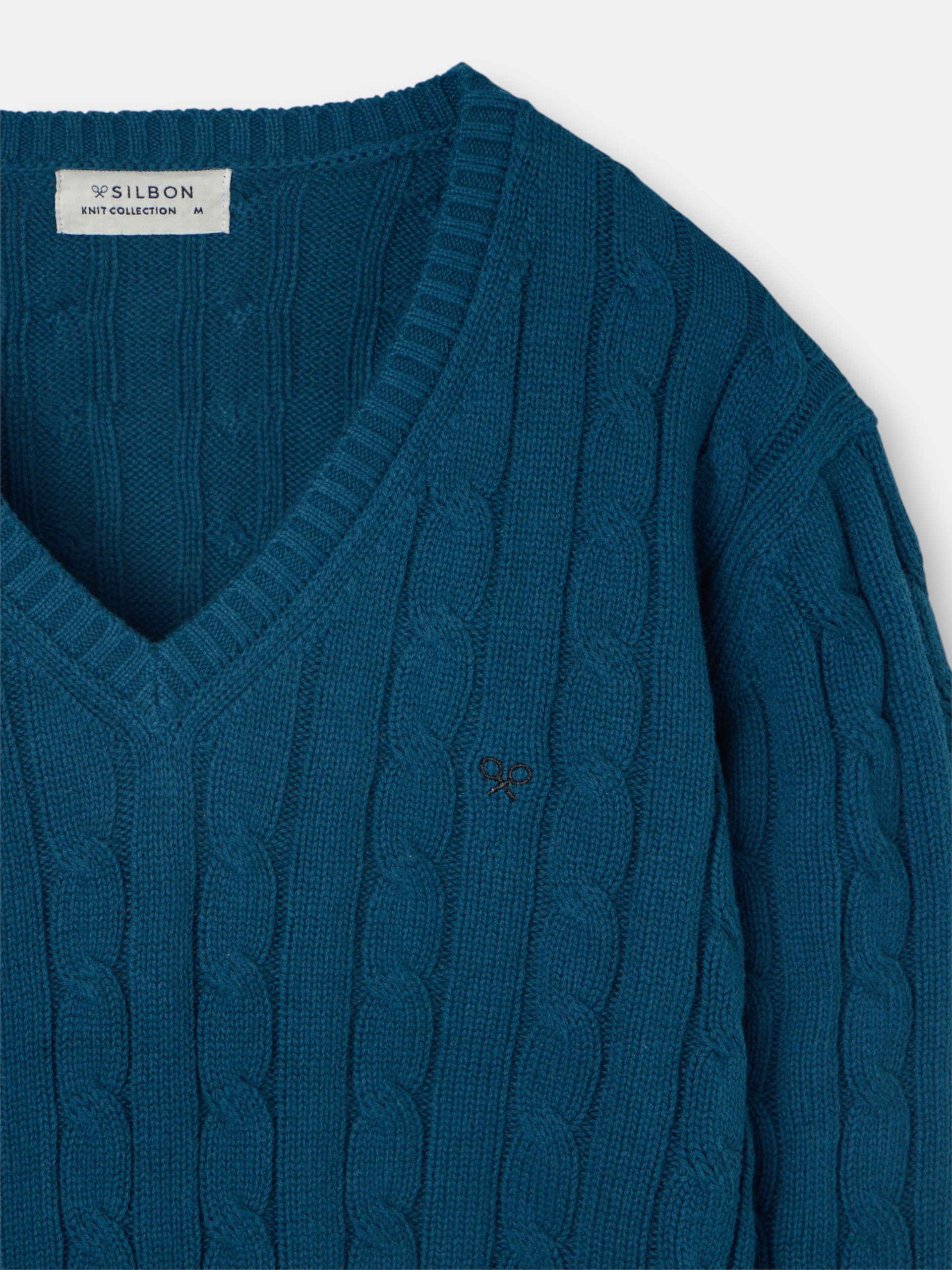 Pull en maille vert à col en V