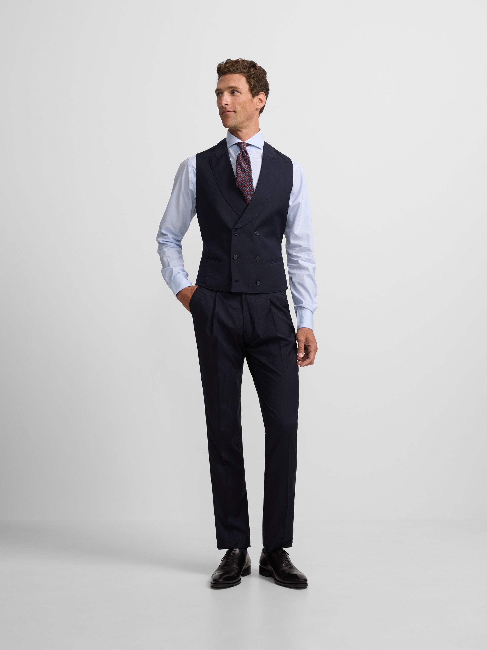 Calças chaque espinha azul-marinho