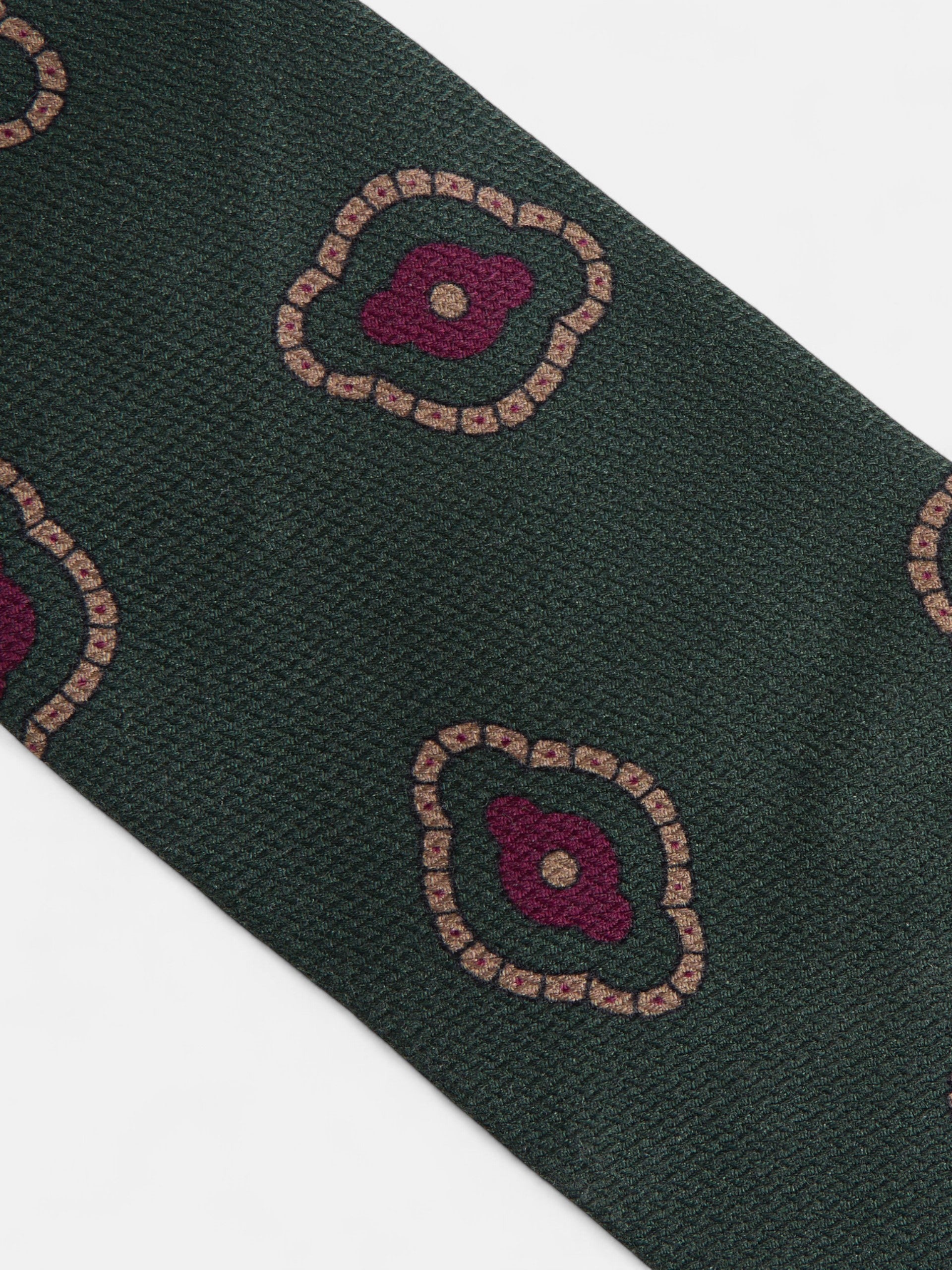 Gravata com padrão geométrico irregular verde