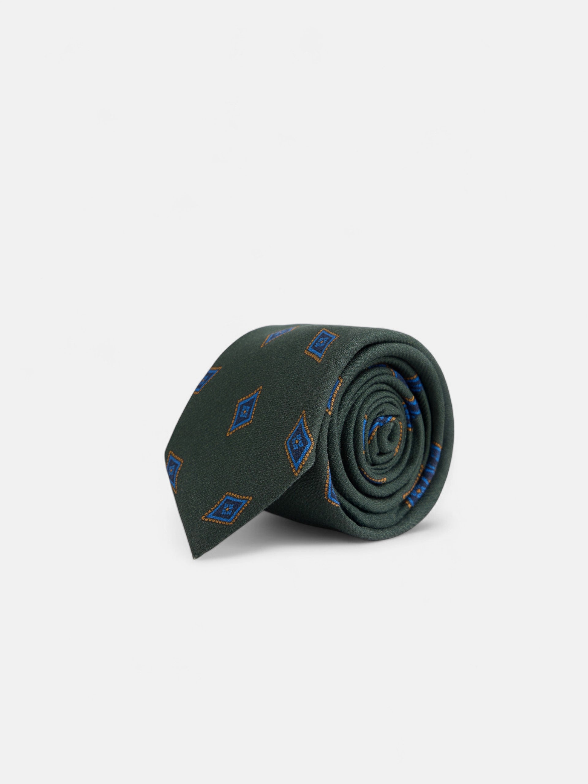 Gravata com padrão de losangos verdes