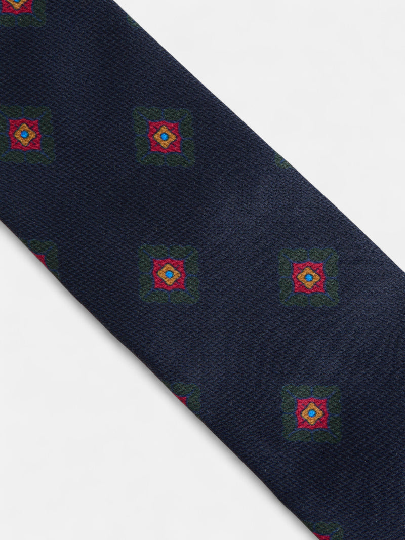 Corbata seda motivo geometrico azul marino