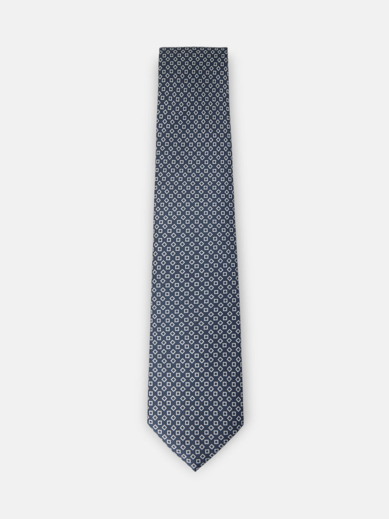 Navy blue tie with irregular check pattern