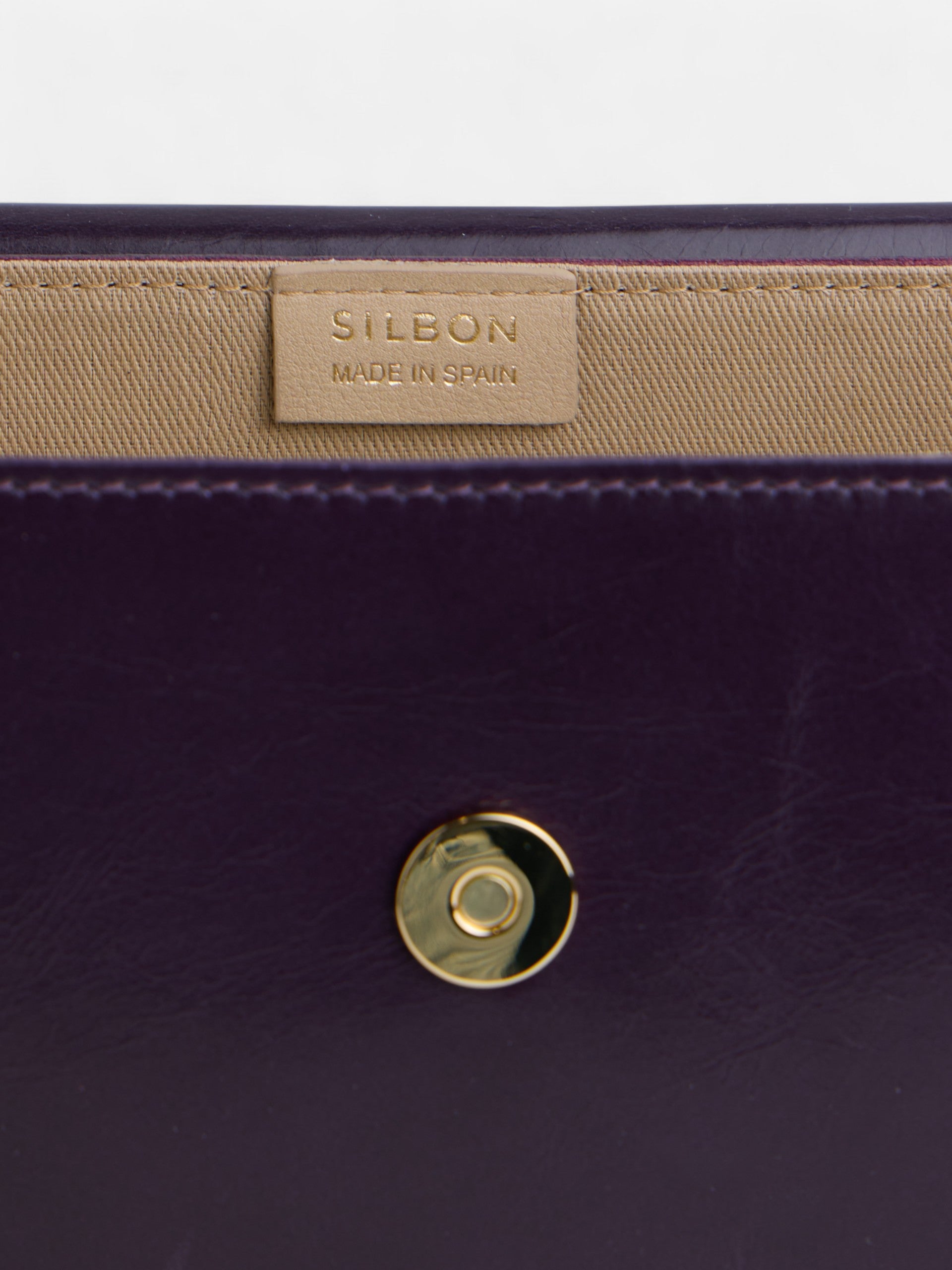 Bolso solapa piel morado