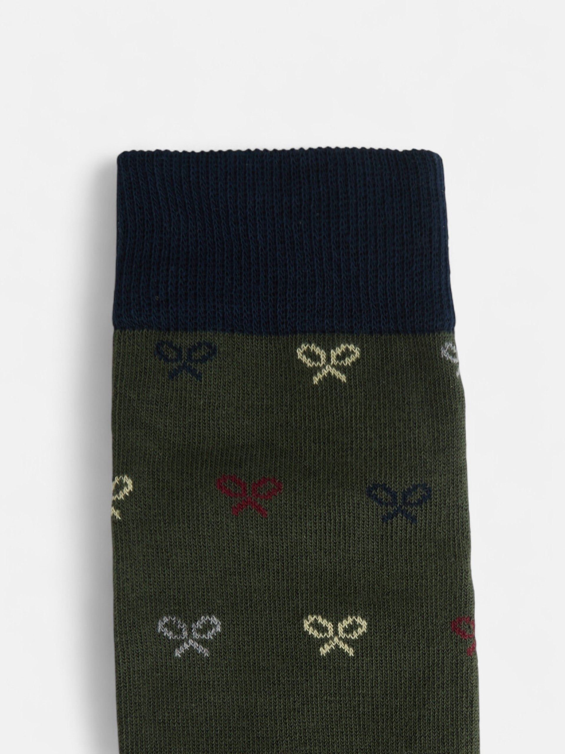 Meia com raquetes em verde