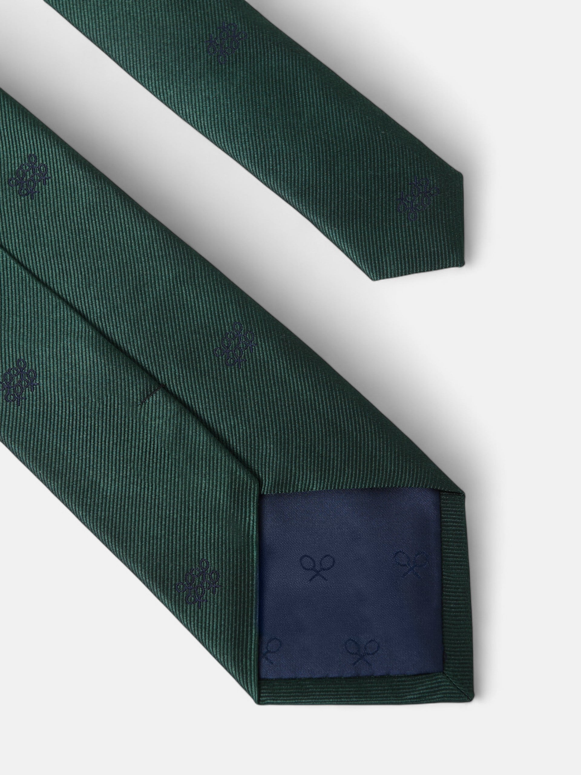 Gravata com padrão geométrico de raquetes verde