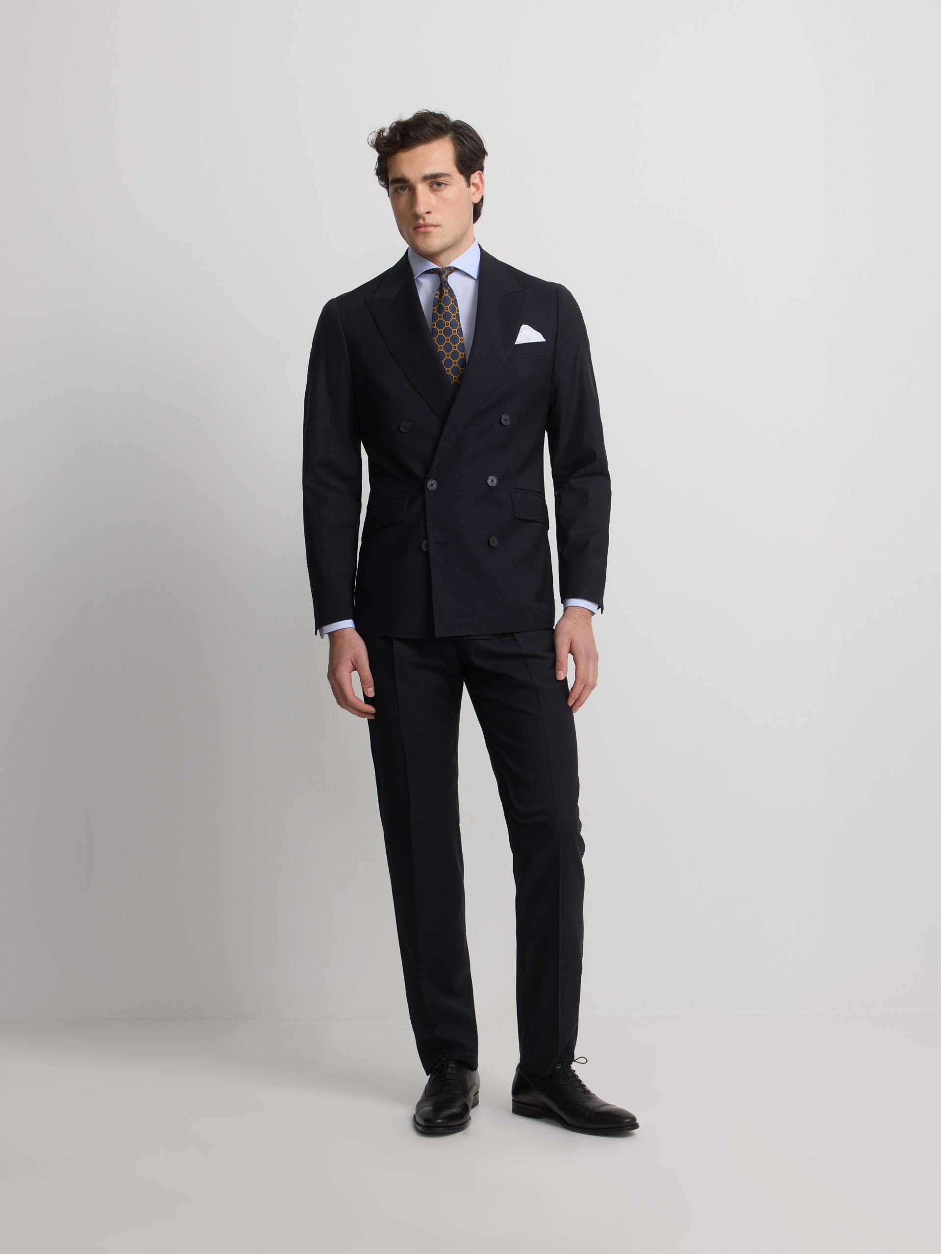 Veste de costume bleu marine à double boutonnage extensible