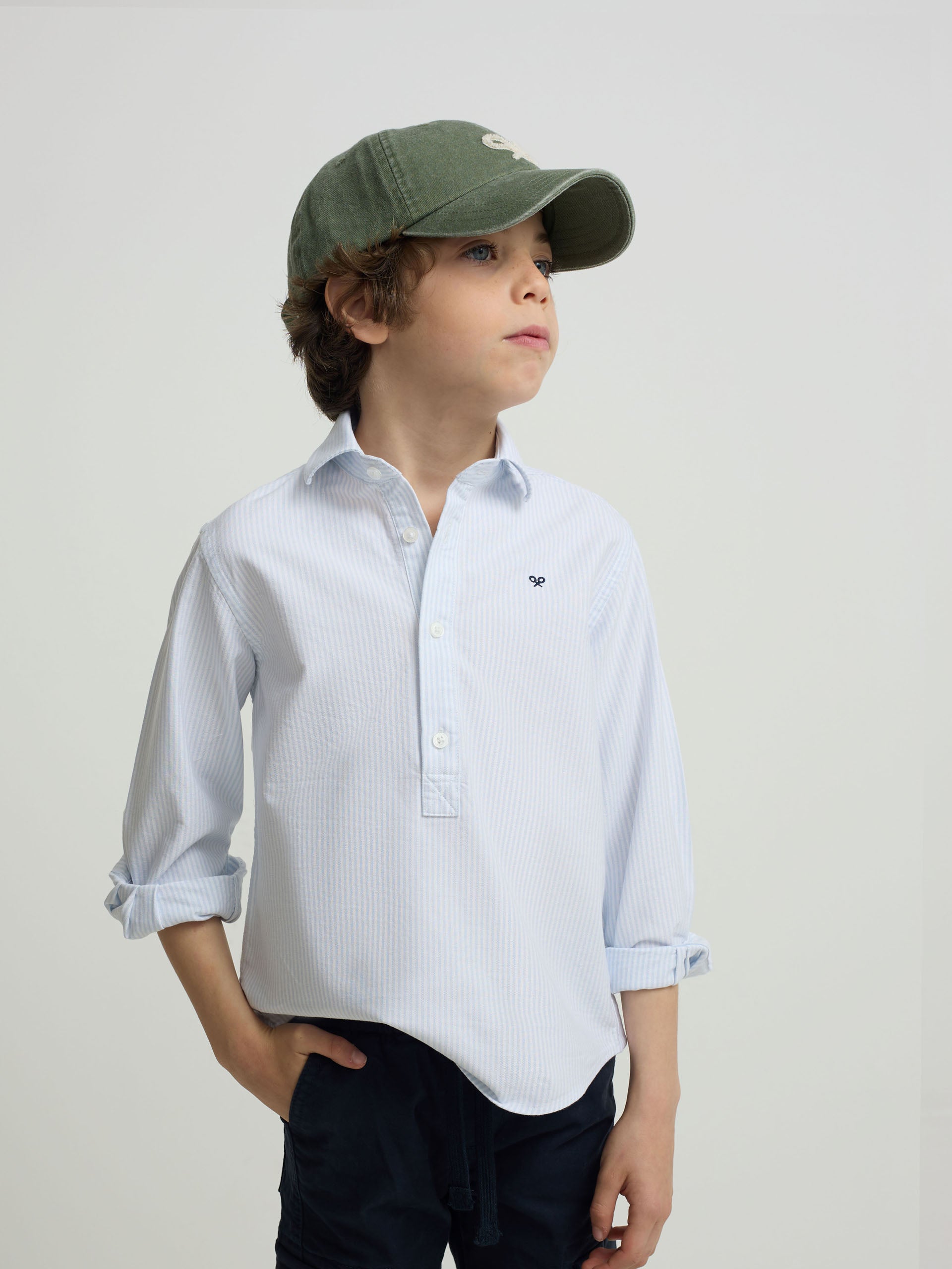 Polo de sport pour enfants à rayures bleues verticales
