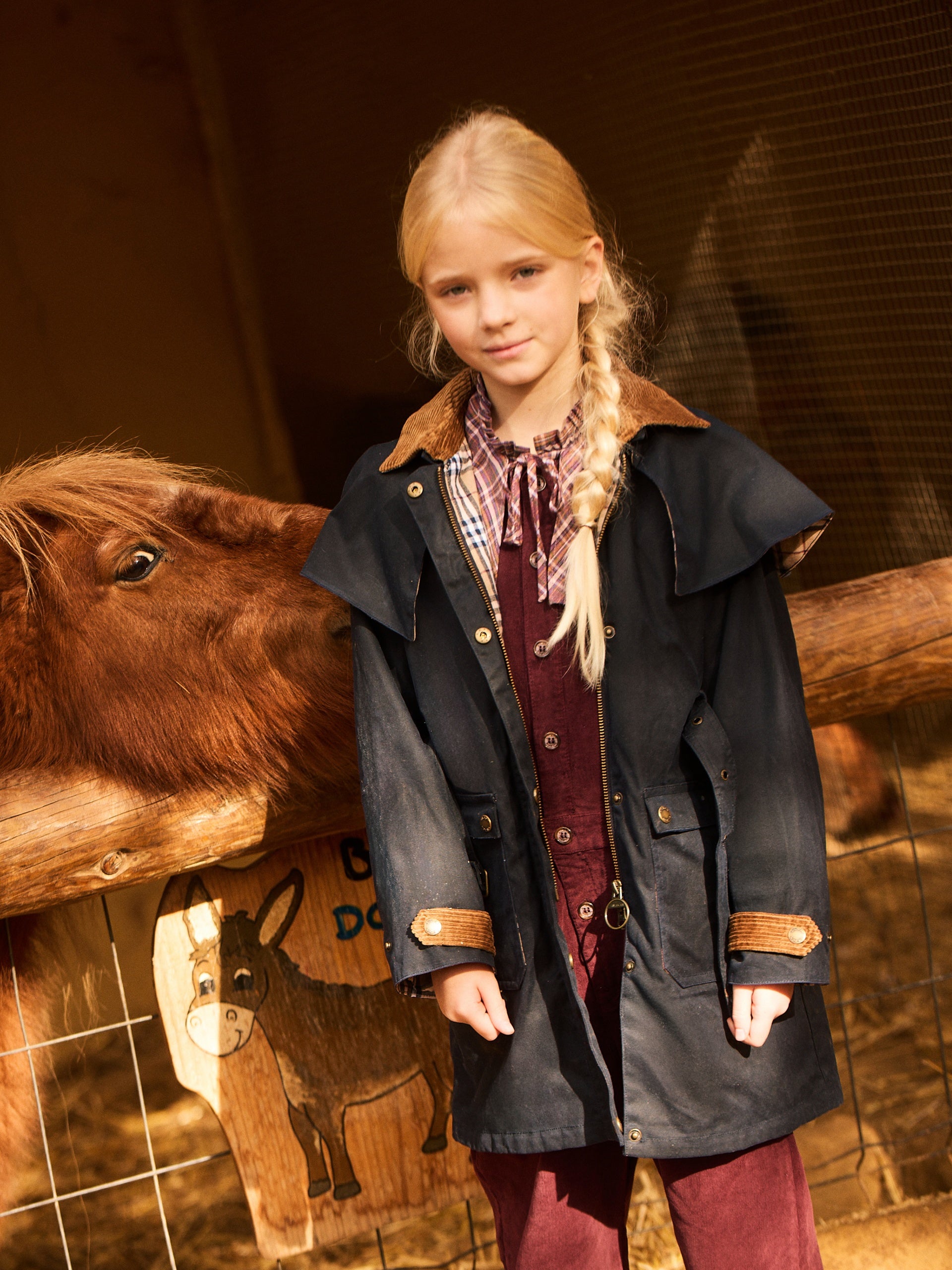 Long waxed navy blue parka for girls