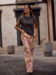 Ikat print denim trousers with roses
