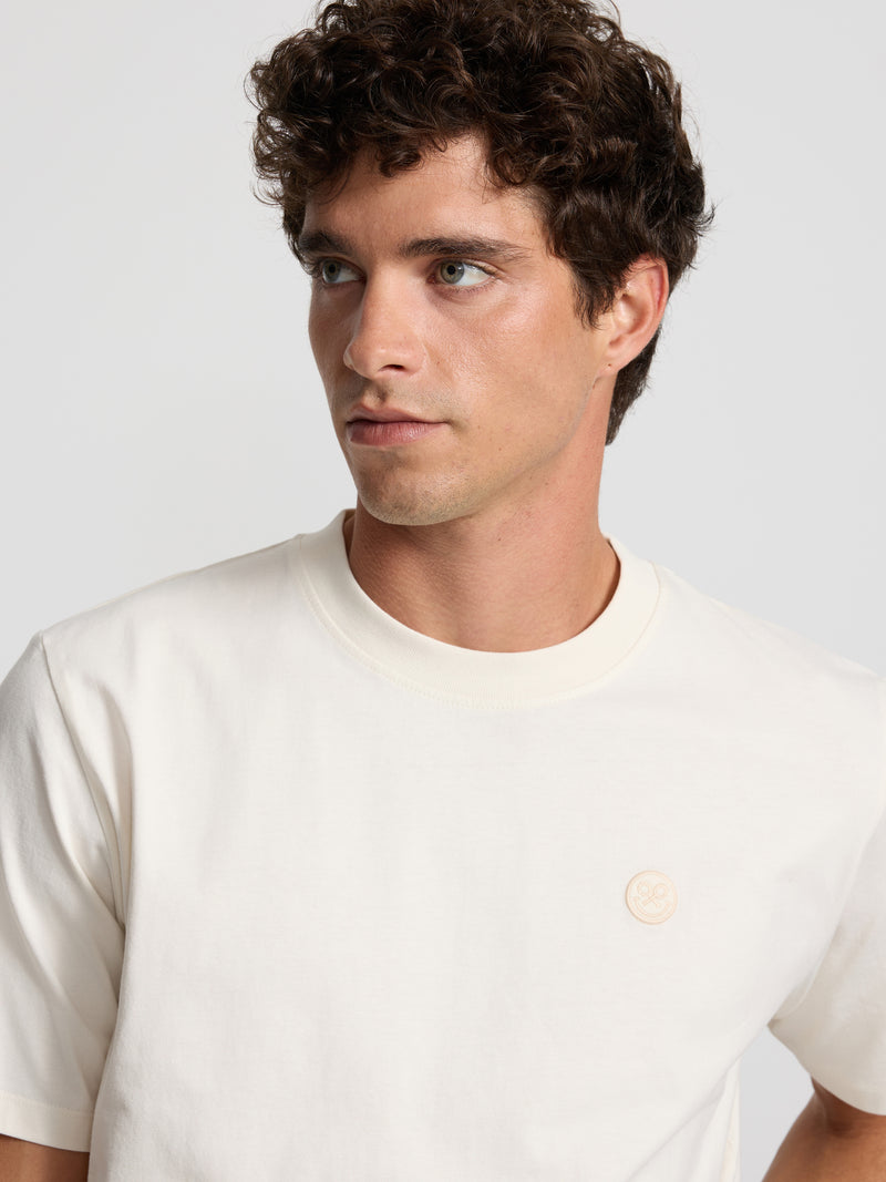 Camiseta logo smile crema