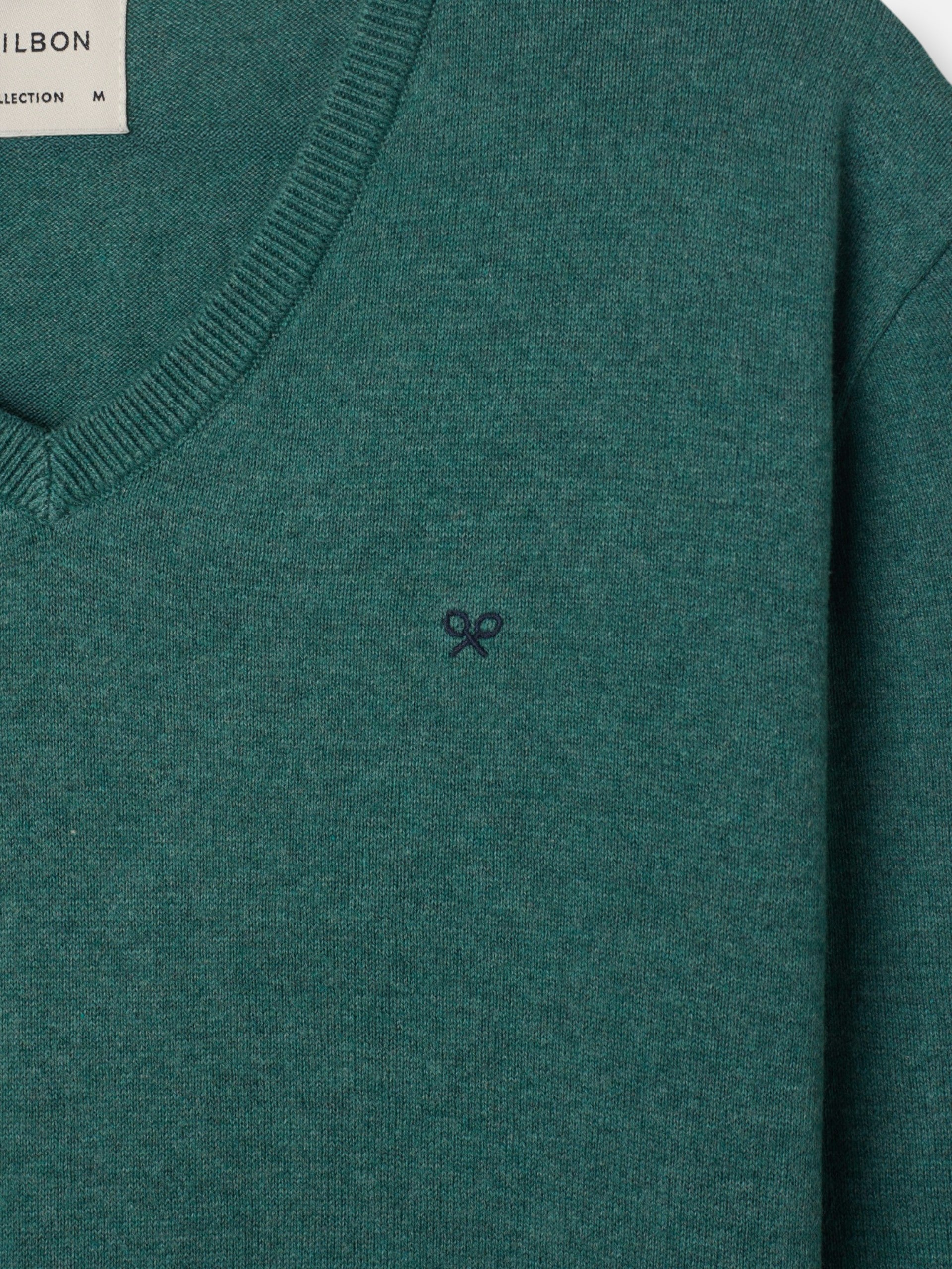 Jersey cuello pico verde petroleo