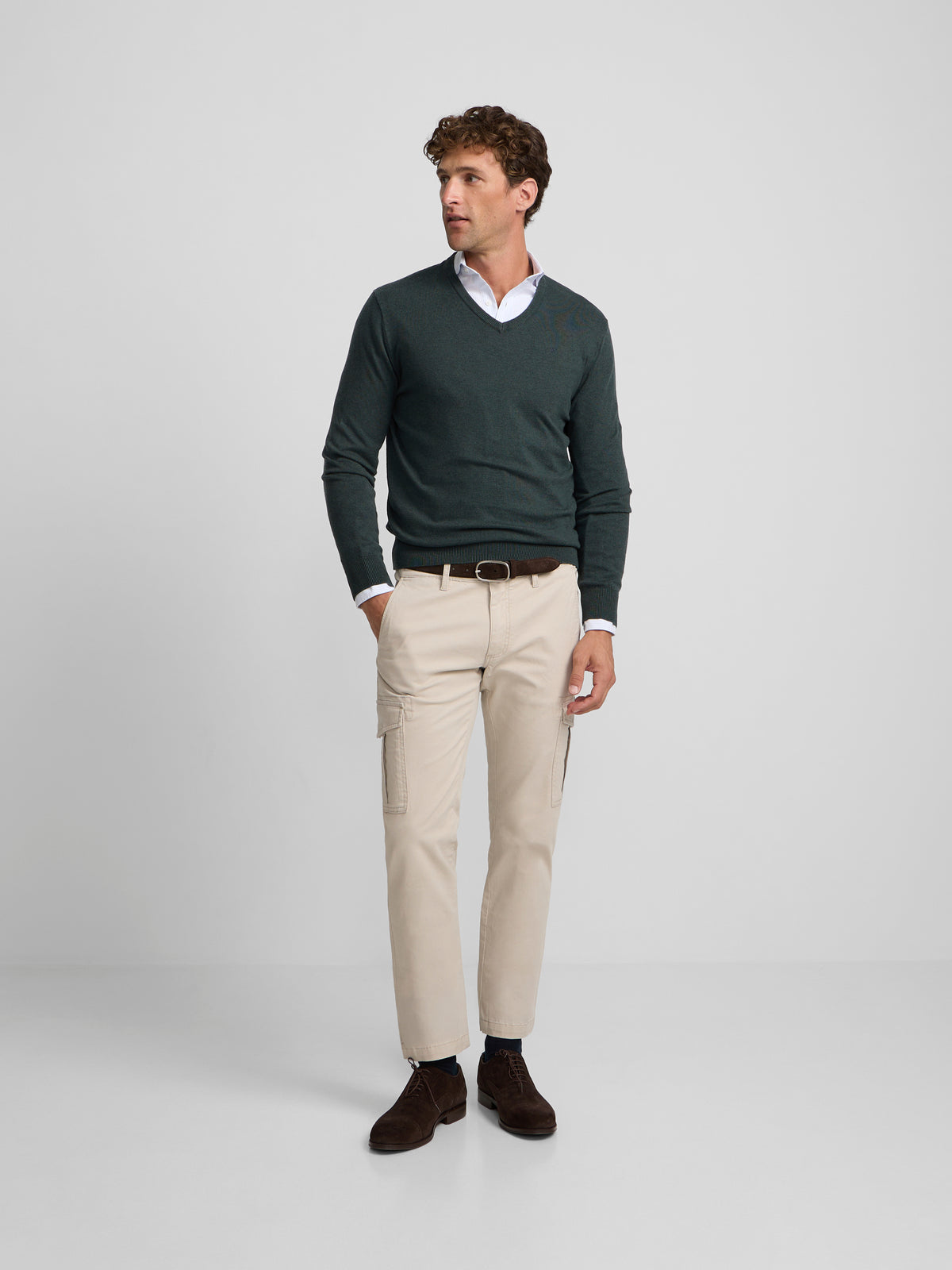 Green V-neck sweater