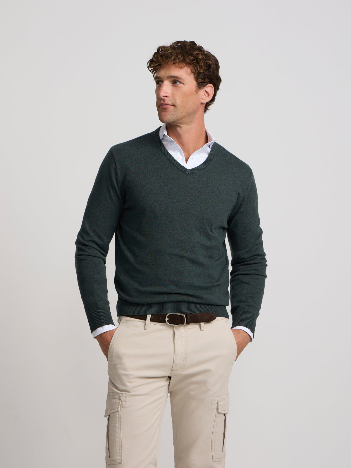 Green V-neck sweater
